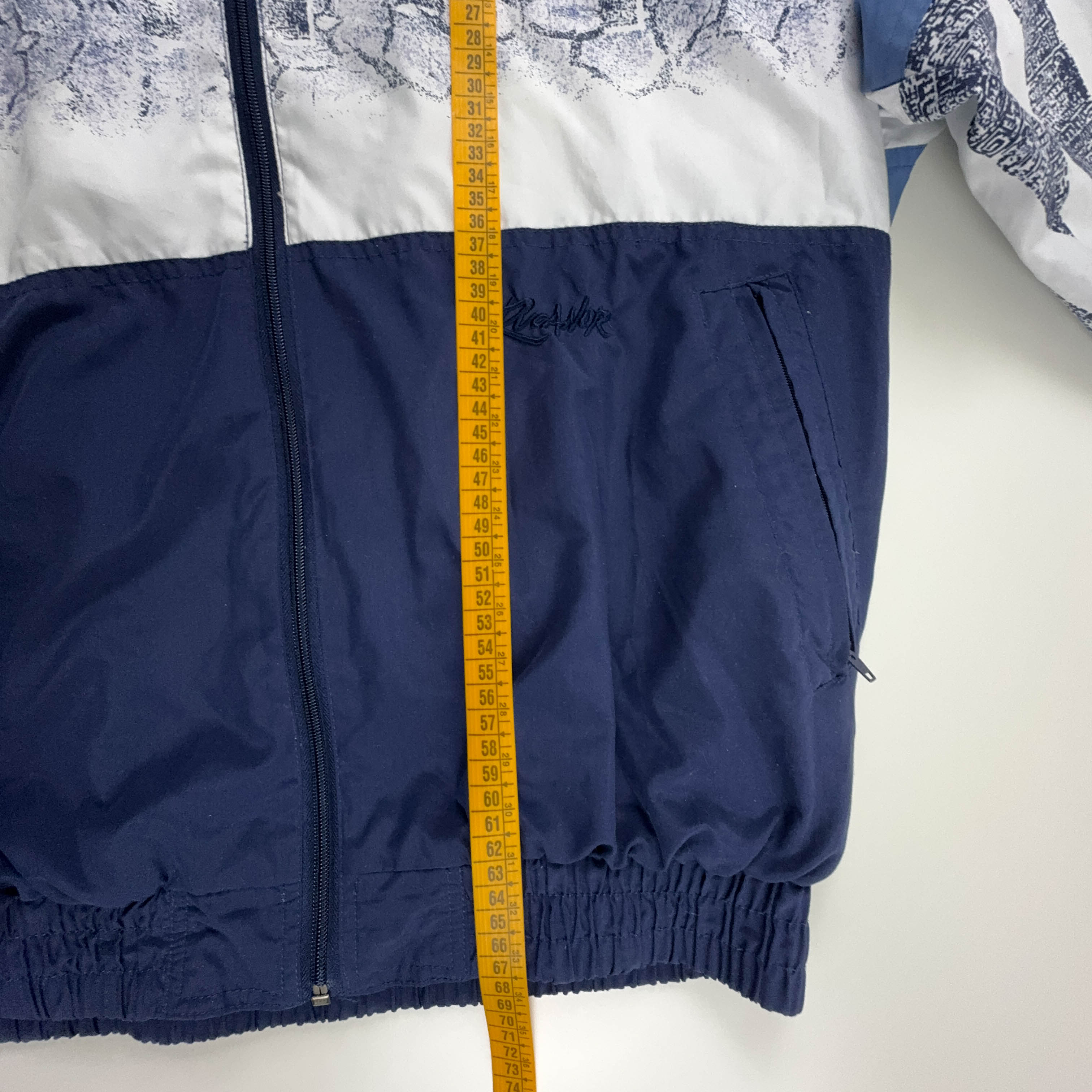 Giacca a vento Vintage blu e bianca a fantasia anni 90 - Taglia L/XL uomo