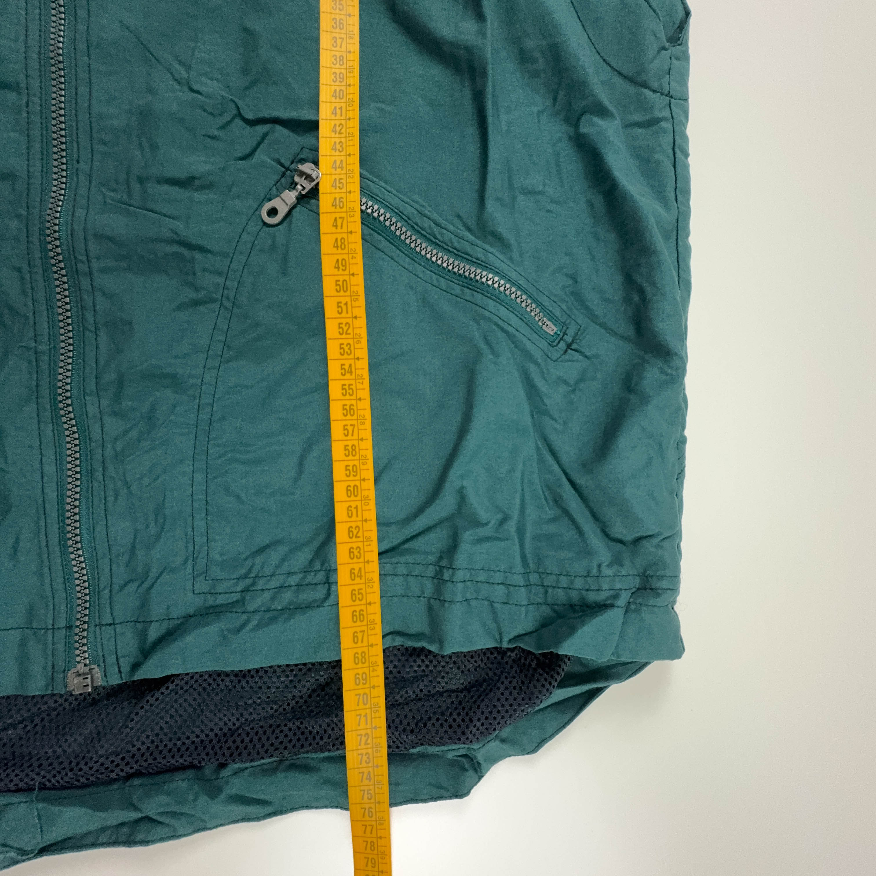 Giacca a vento Reebok Vintage smanicata verde scuro con zip anni 90 - Taglia L/XL uomo