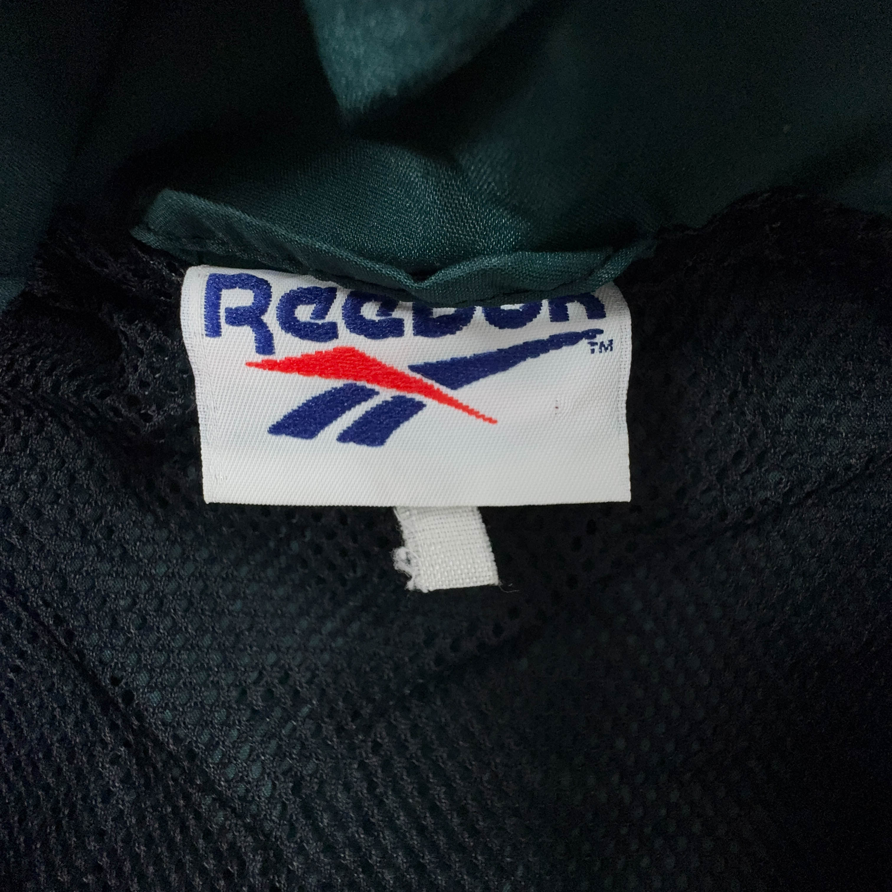 Giacca a vento Reebok Vintage smanicata verde scuro con zip anni 90 - Taglia L/XL uomo