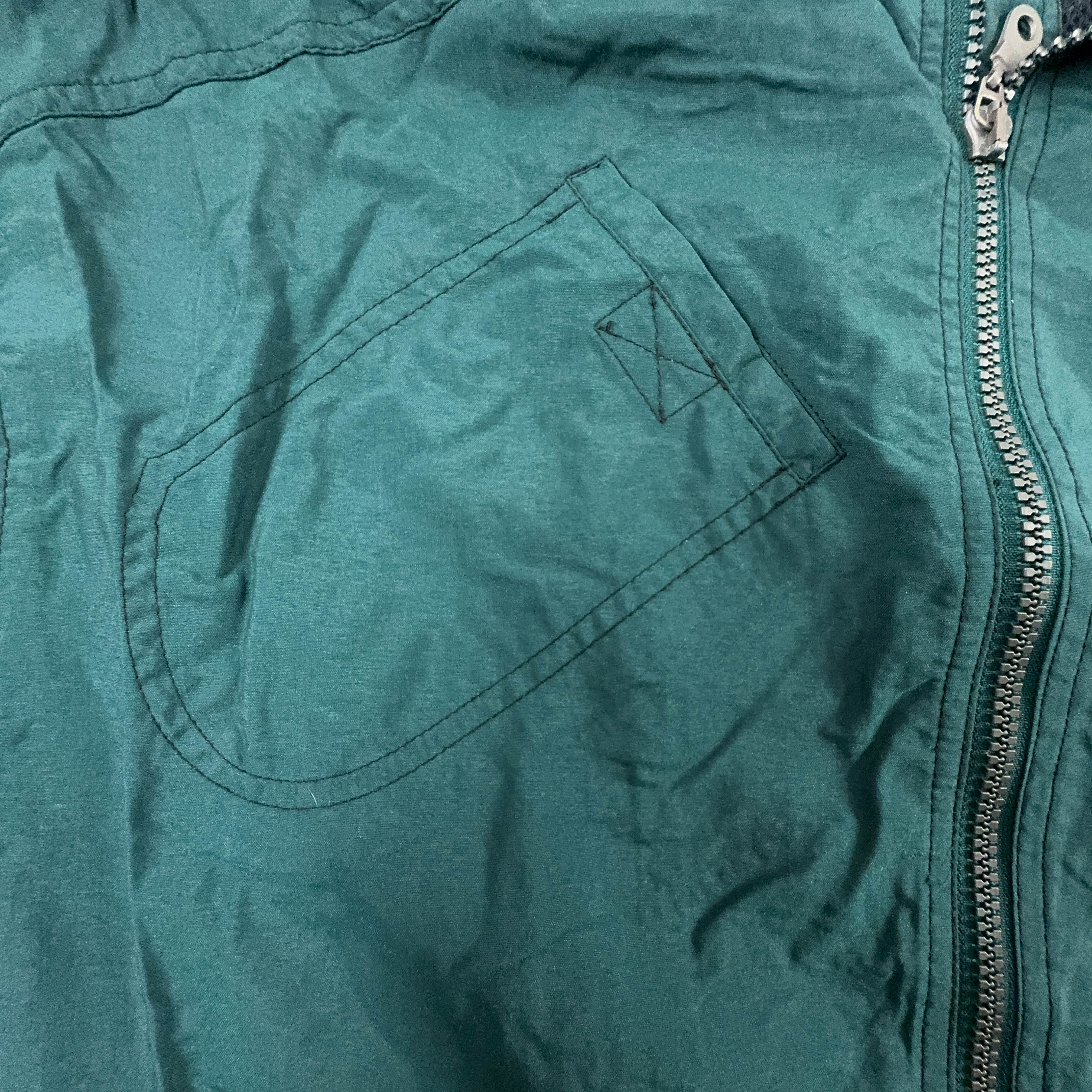Giacca a vento Reebok Vintage smanicata verde scuro con zip anni 90 - Taglia L/XL uomo