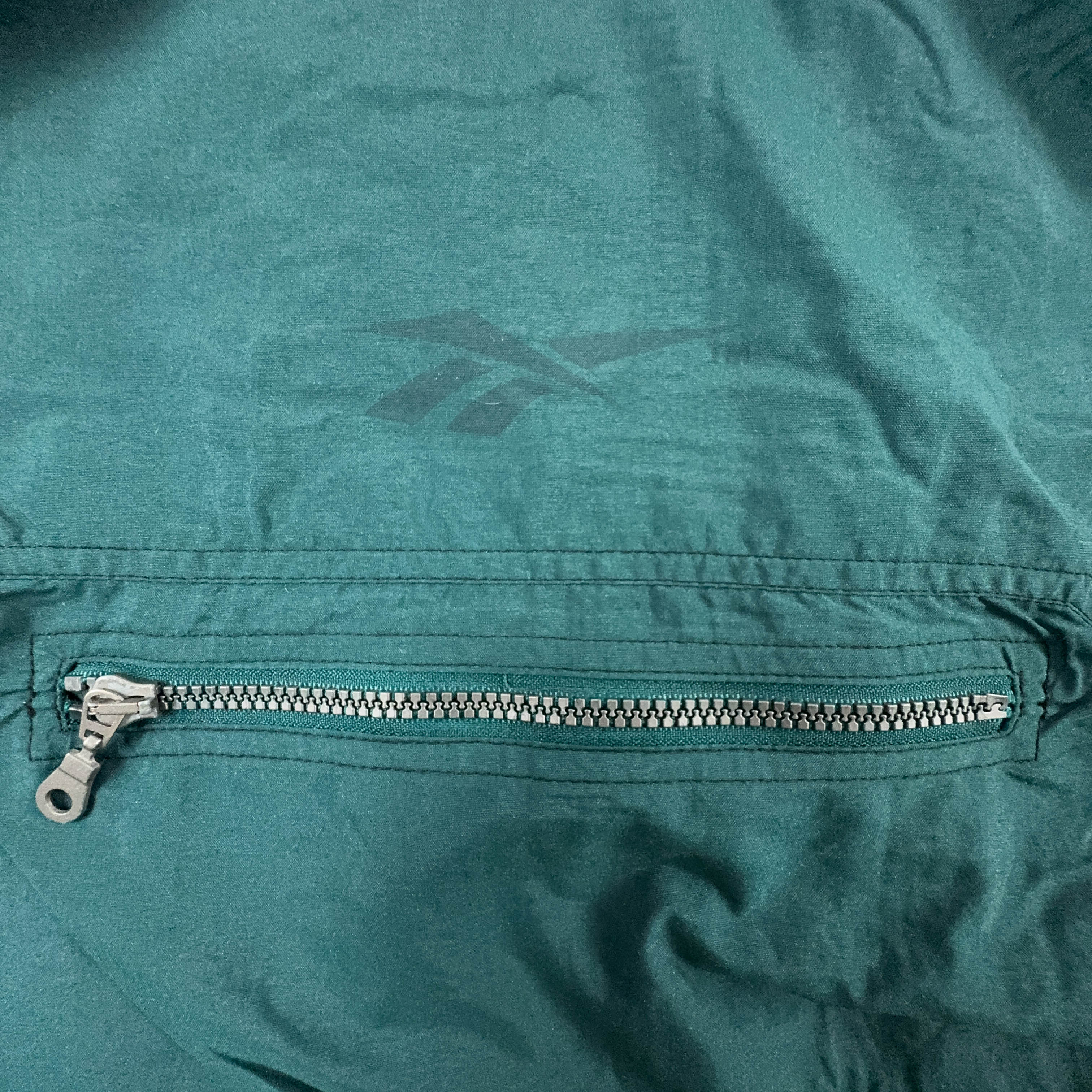 Giacca a vento Reebok Vintage smanicata verde scuro con zip anni 90 - Taglia L/XL uomo