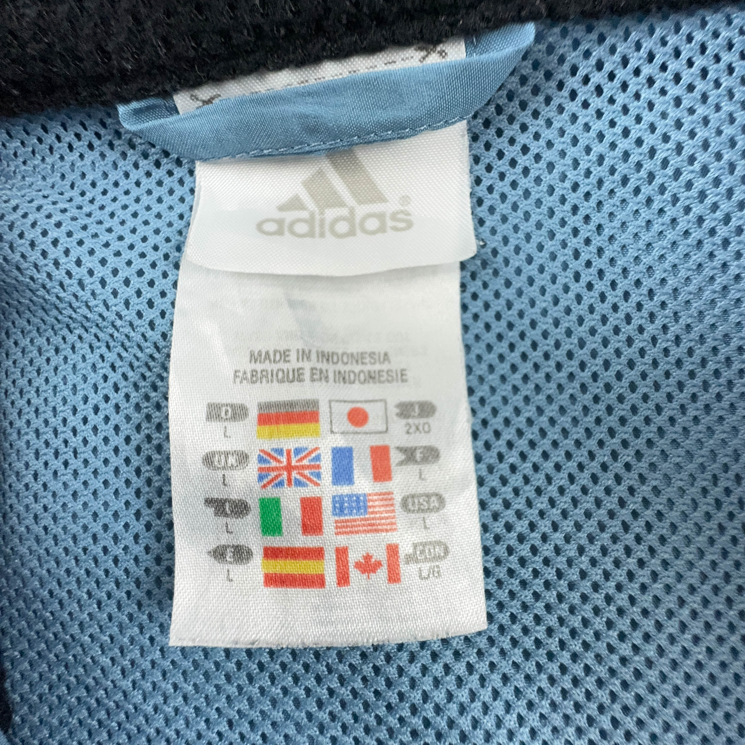 Giacca a vento smanicata Adidas Vintage blu e blu scuro con zip anni 2000 - Taglia L uomo