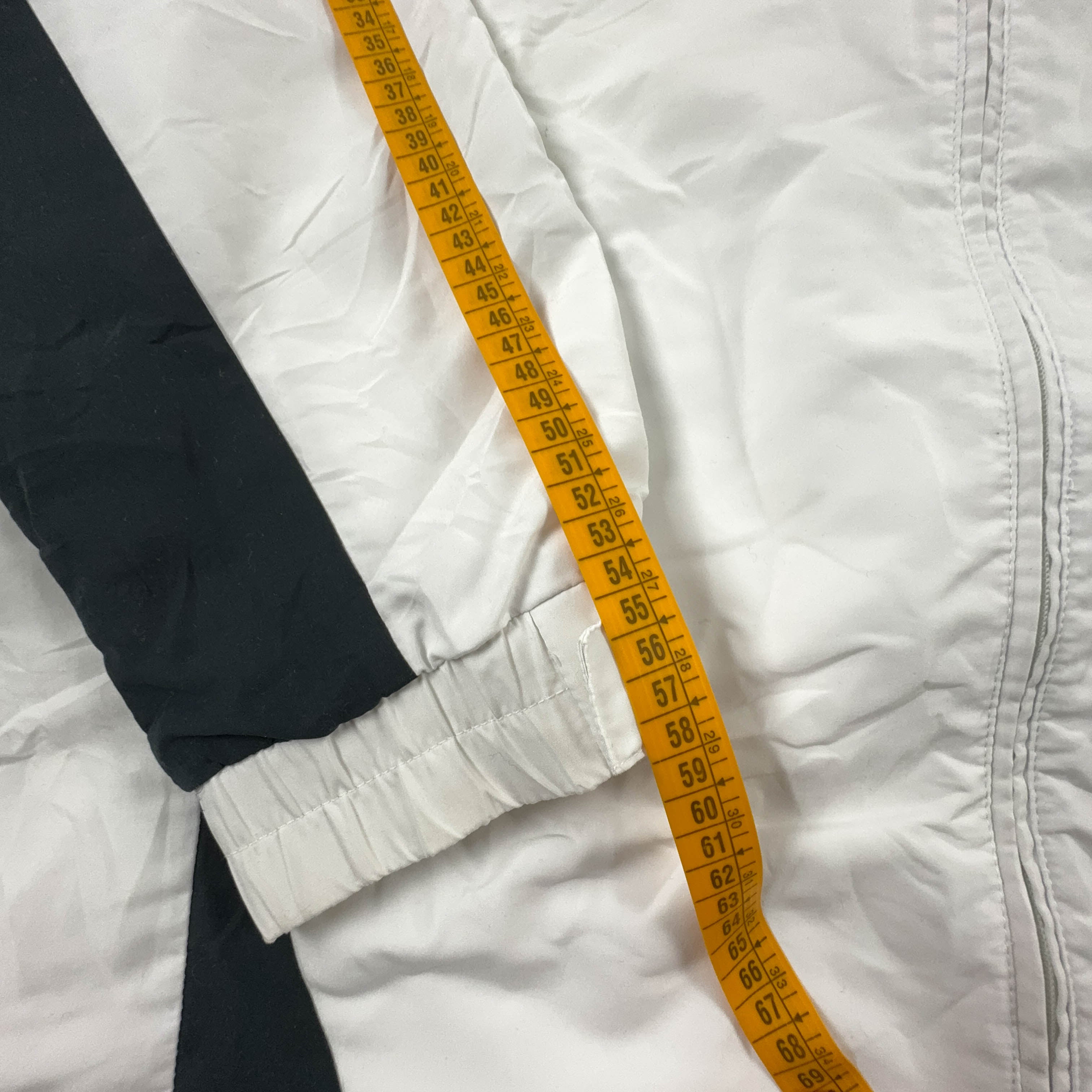 Giacca a vento Lotto Vintage bianca e nera con zip anni 2000 - Taglia XL/XXL uomo
