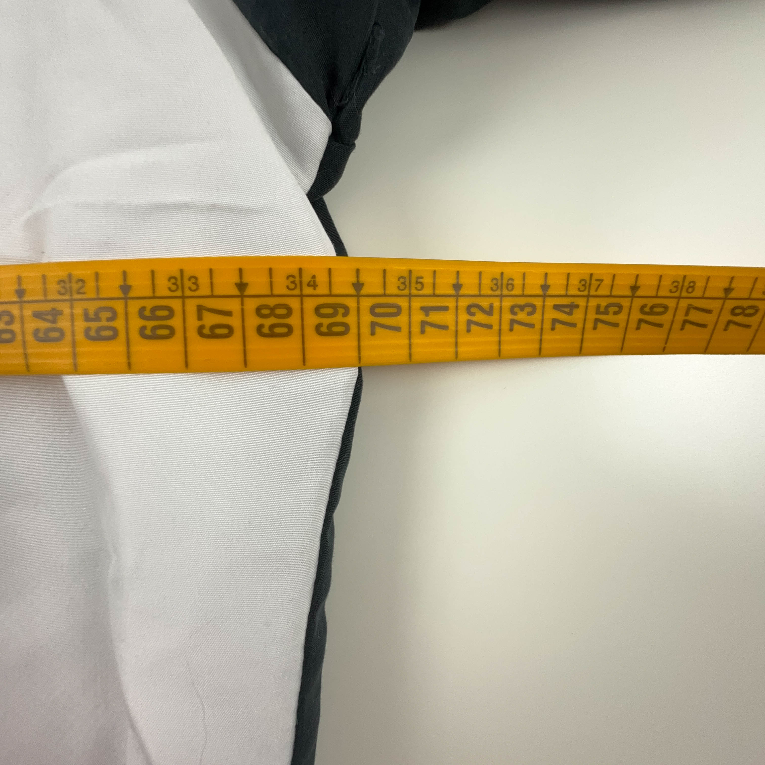 Giacca a vento Lotto Vintage bianca e nera con zip anni 2000 - Taglia XL/XXL uomo