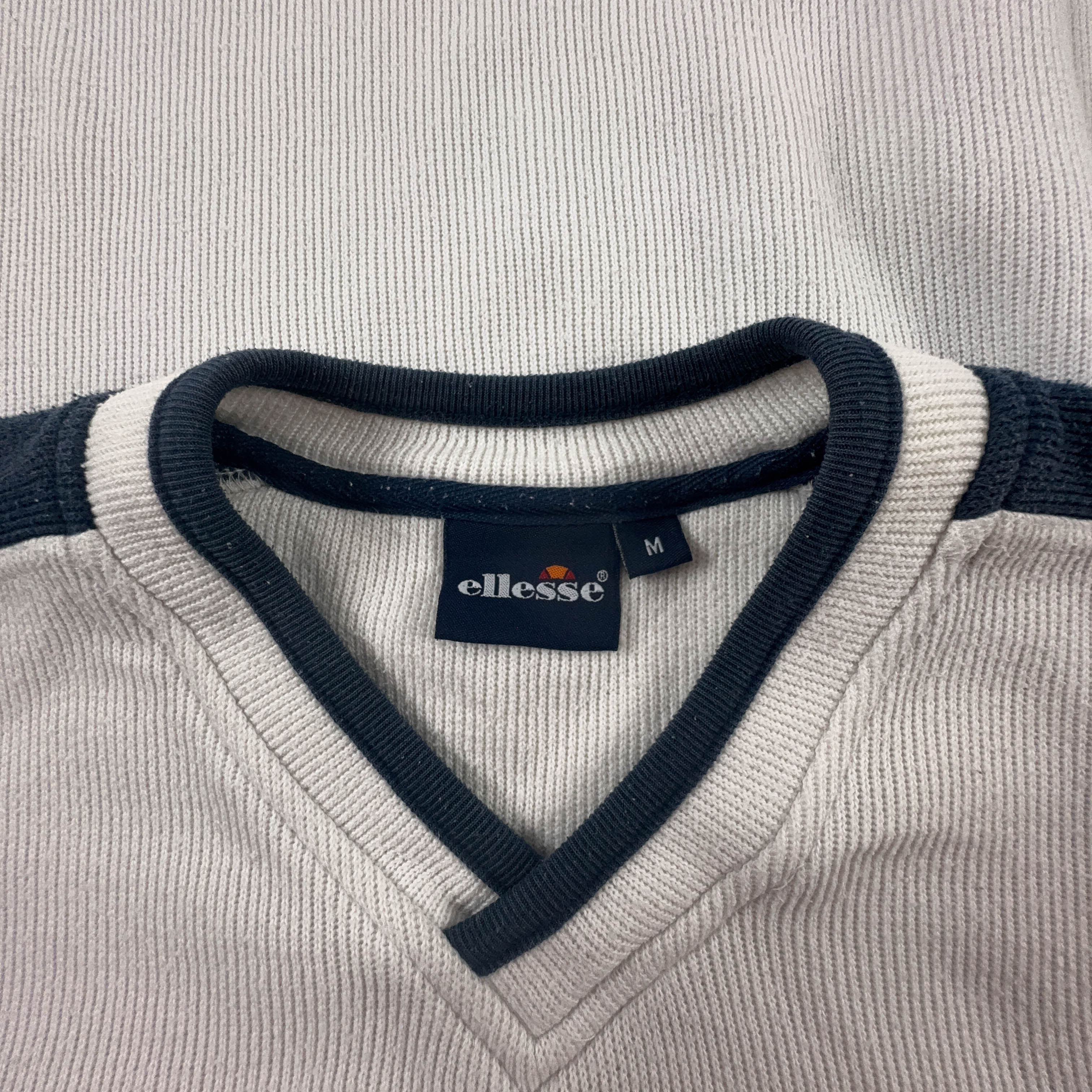 Felpa Ellesse Vintage bianca con scollo a V anni 2000 - Taglia M/L uomo