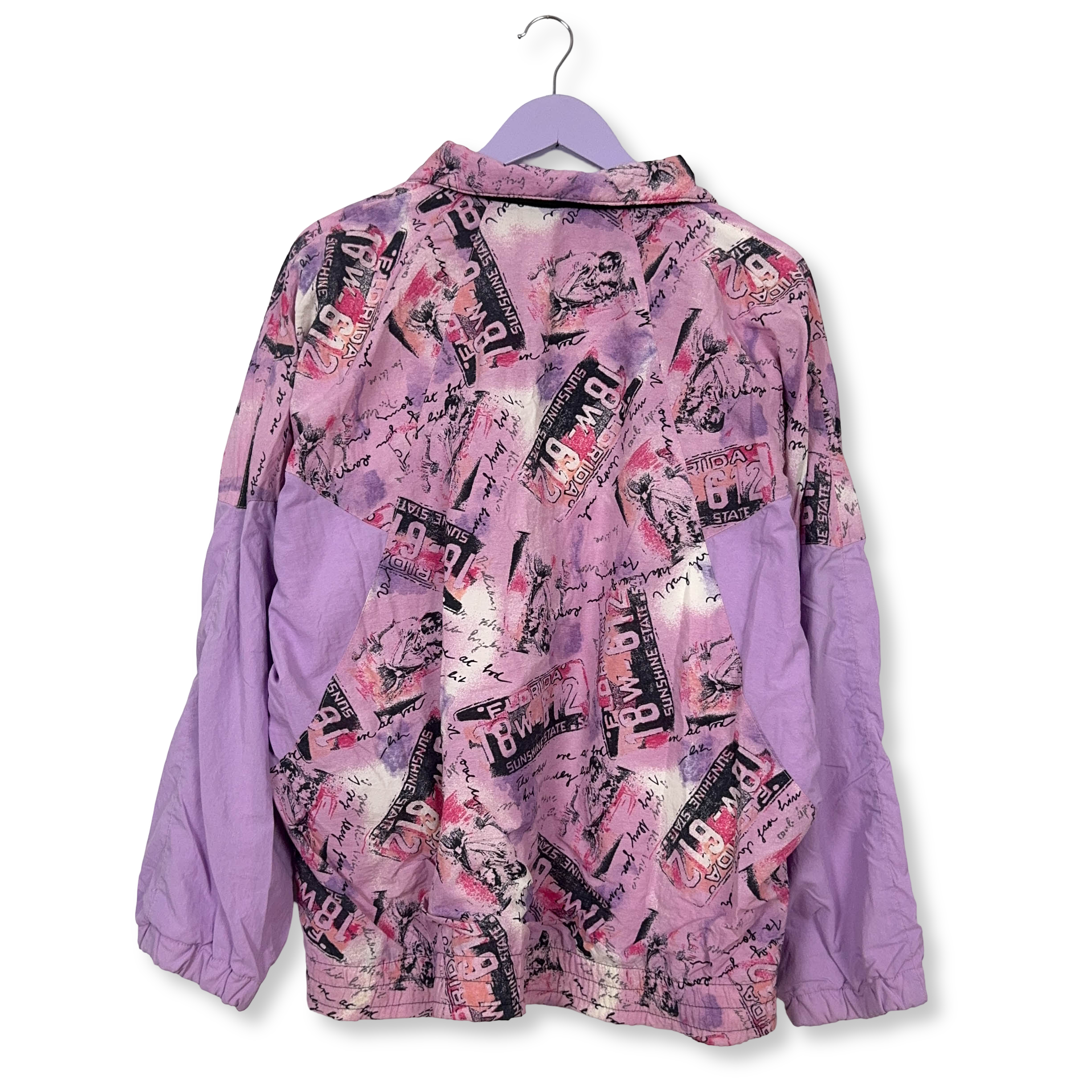 Giacca a vento Vintage viola con fantasia all over e zip anni 90 - Taglia 44 uomo