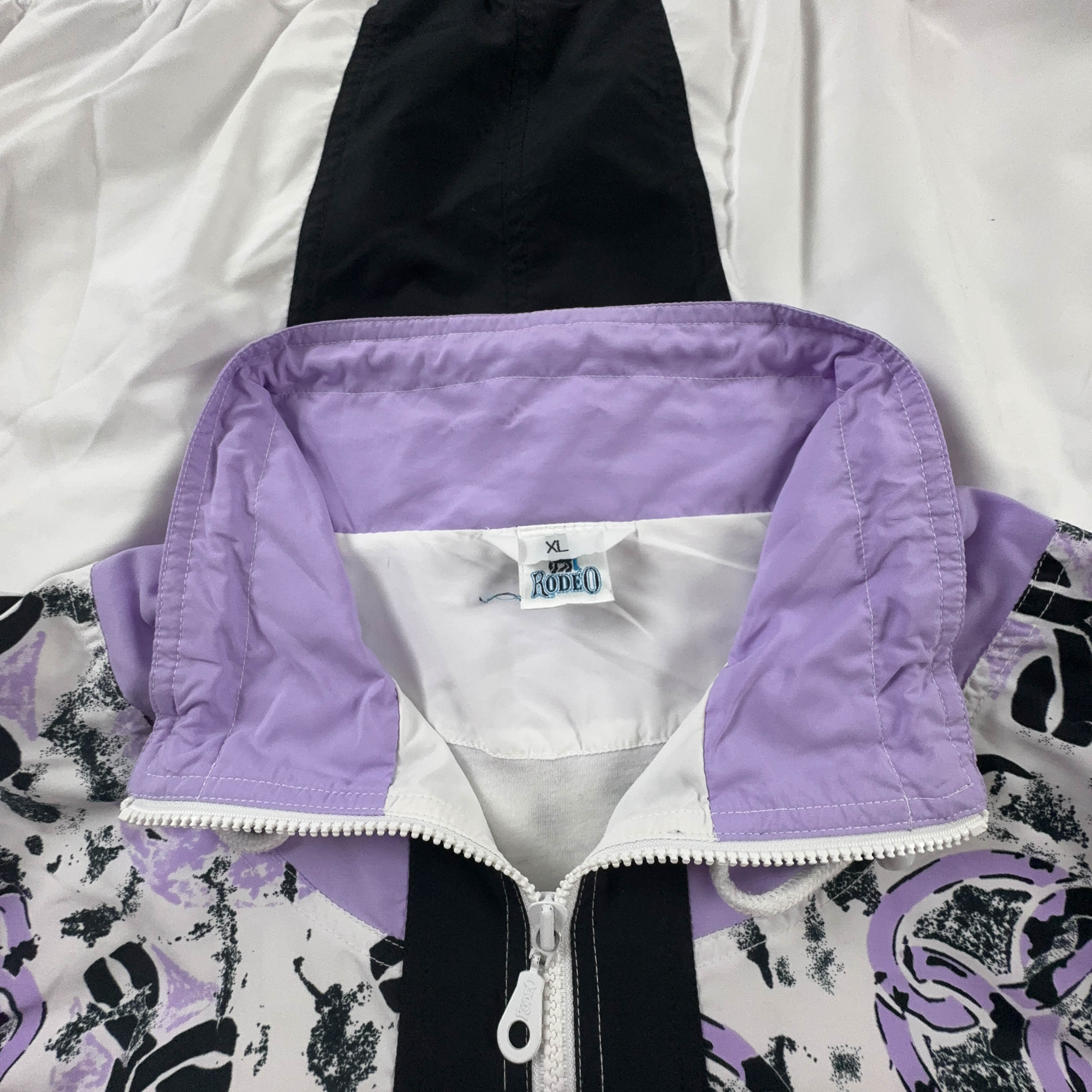 Giacca a vento Rodeo Vintage bianca e lillà a fantasia con zip anni 90 - Taglia L/XL uomo