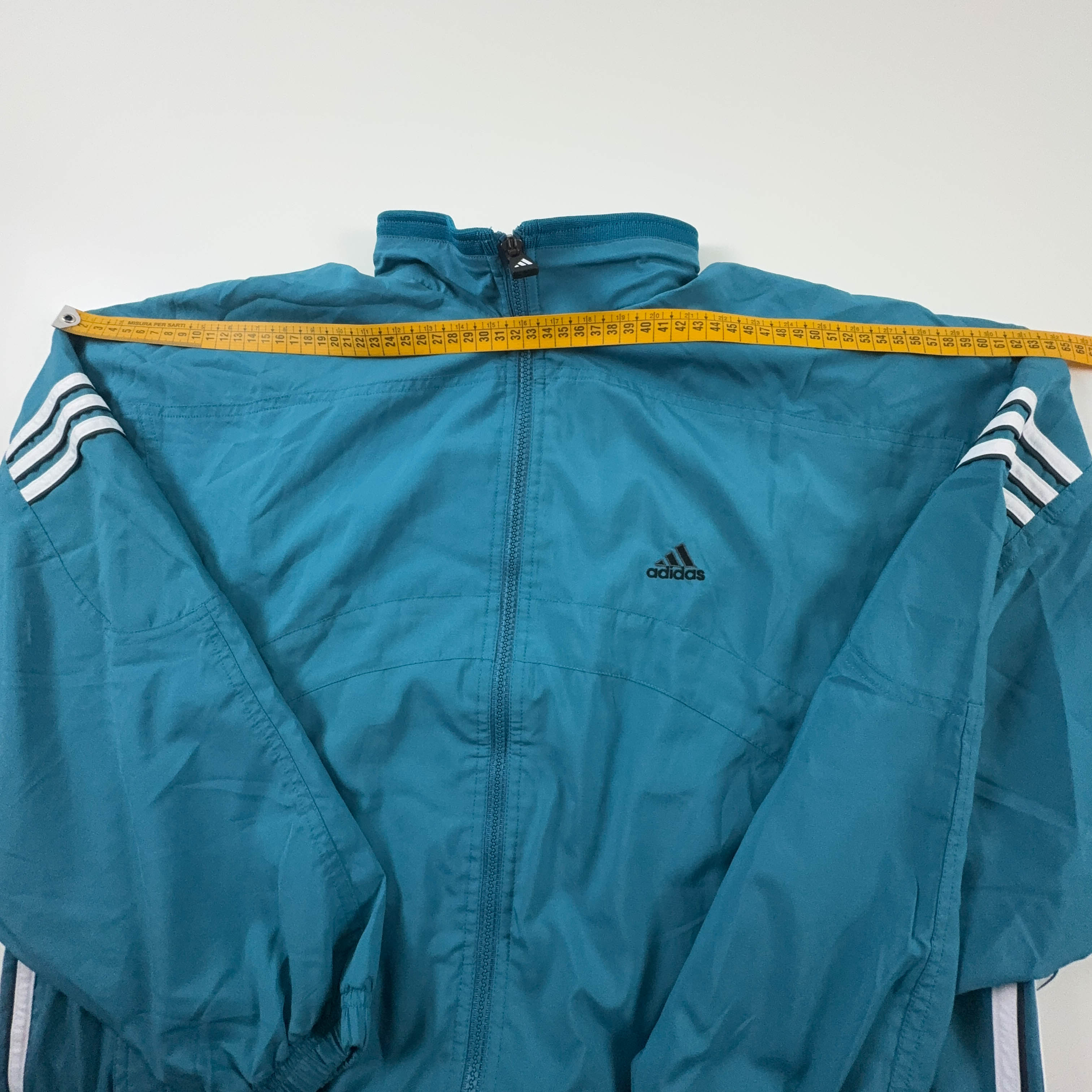 Giacca a vento Adidas Vintage azzurra con zip anni 90 - Taglia 44 uomo