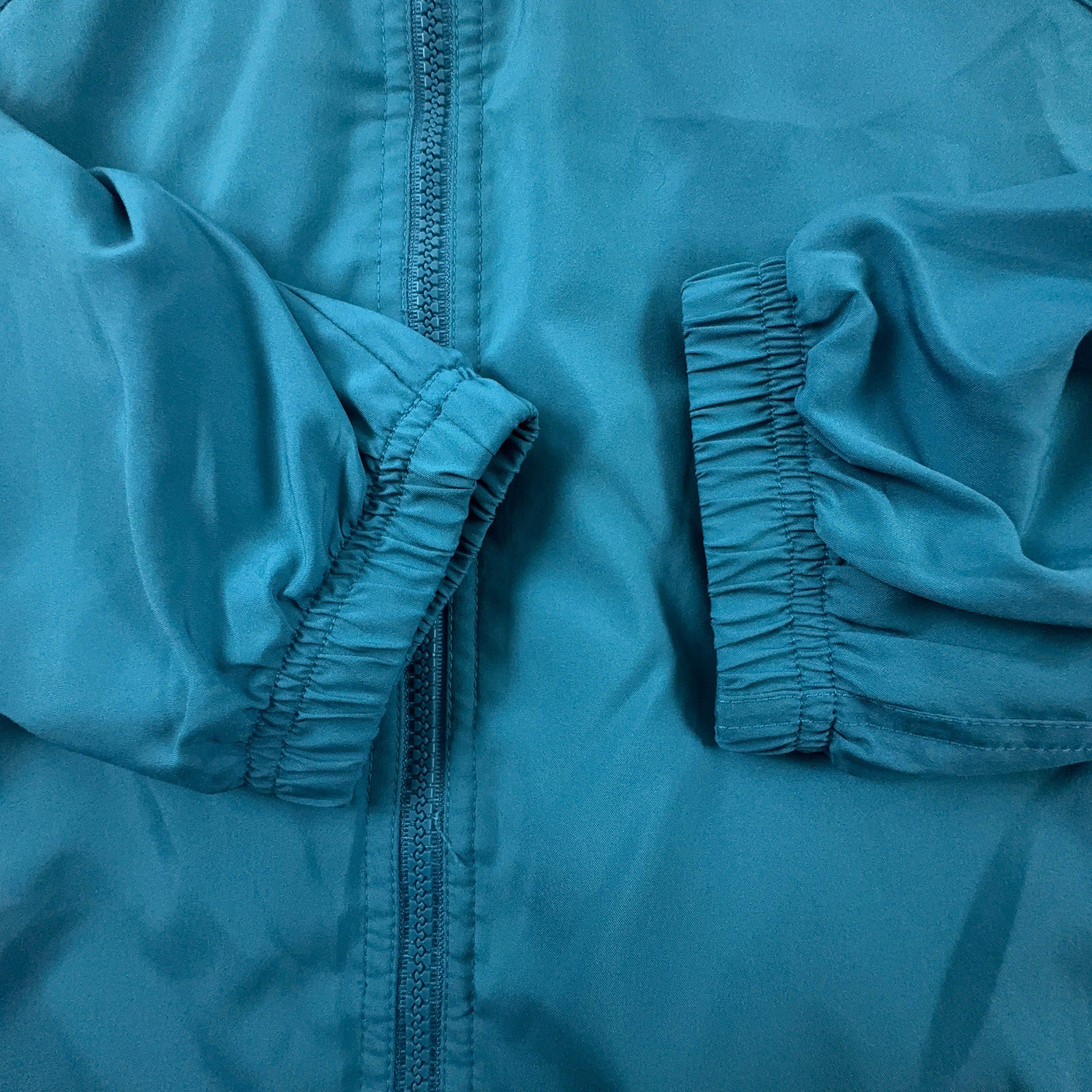 Giacca a vento Adidas Vintage azzurra con zip anni 90 - Taglia 44 uomo