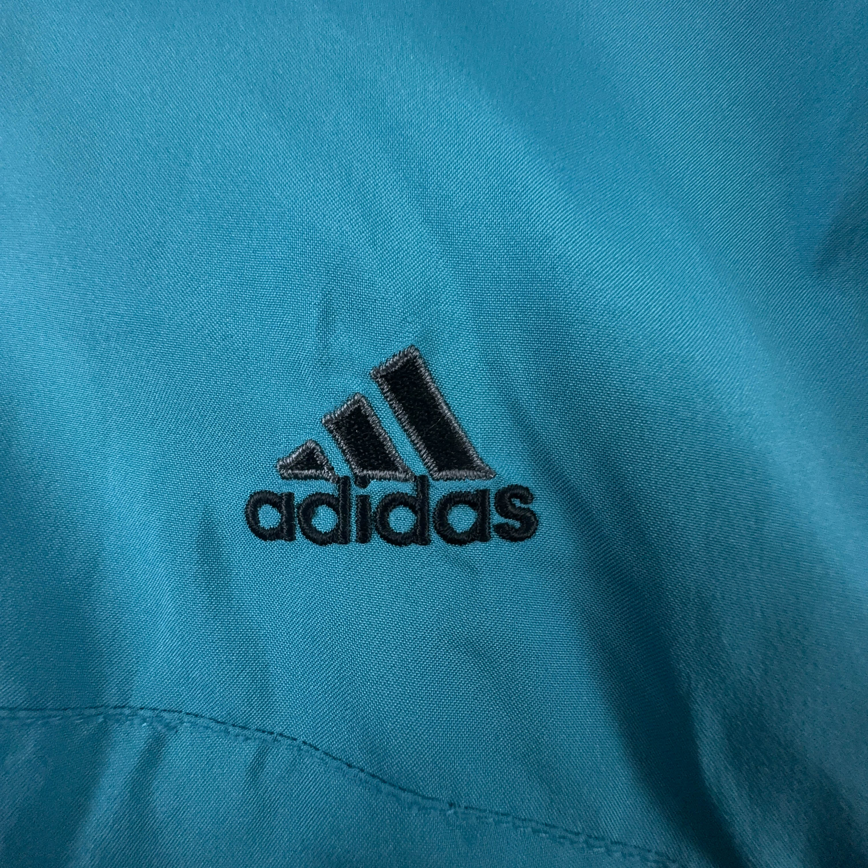 Giacca a vento Adidas Vintage azzurra con zip anni 90 - Taglia 44 uomo