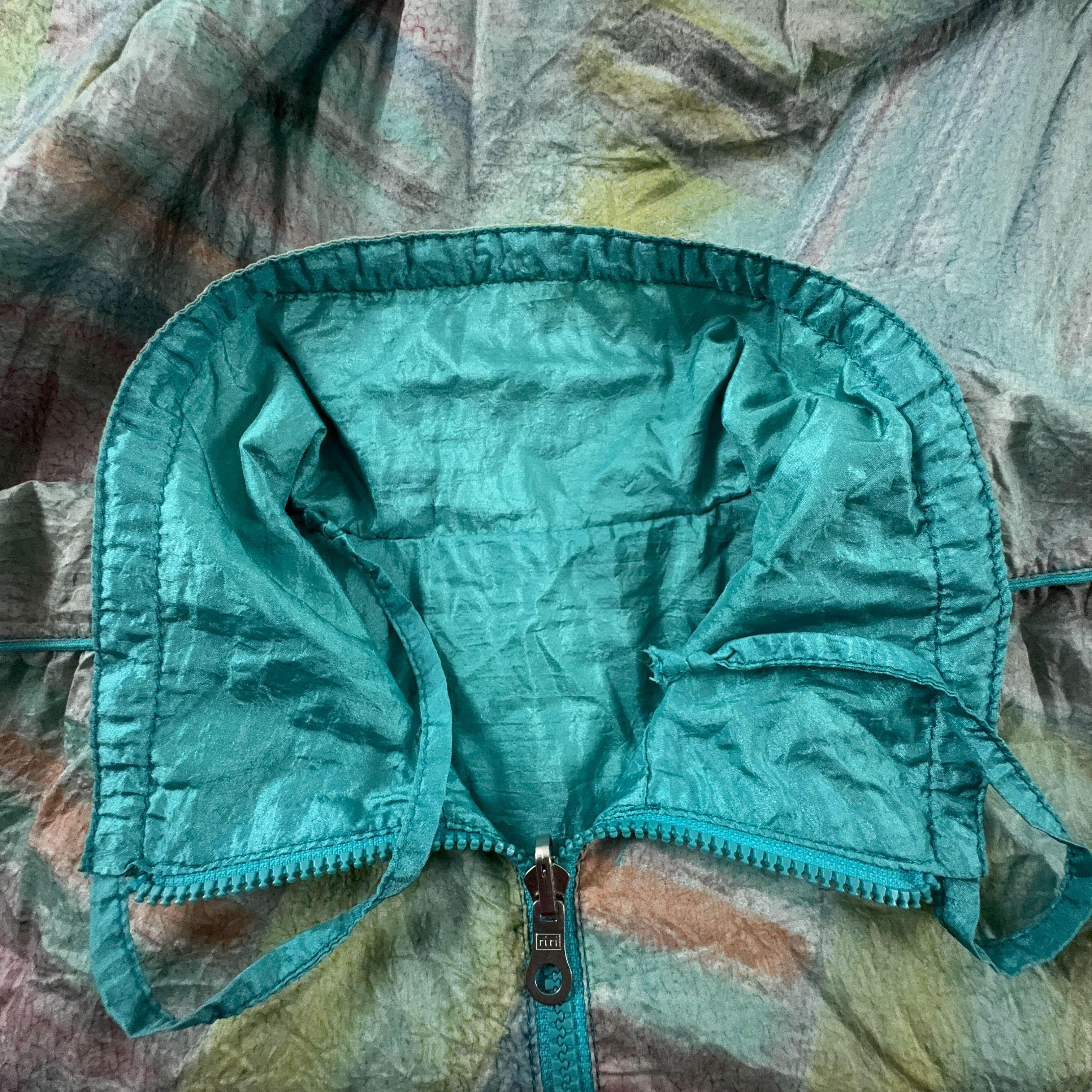 Giacca a vento Ellesse Vintage Double Face verde acqua con fantasia - Taglia M uomo