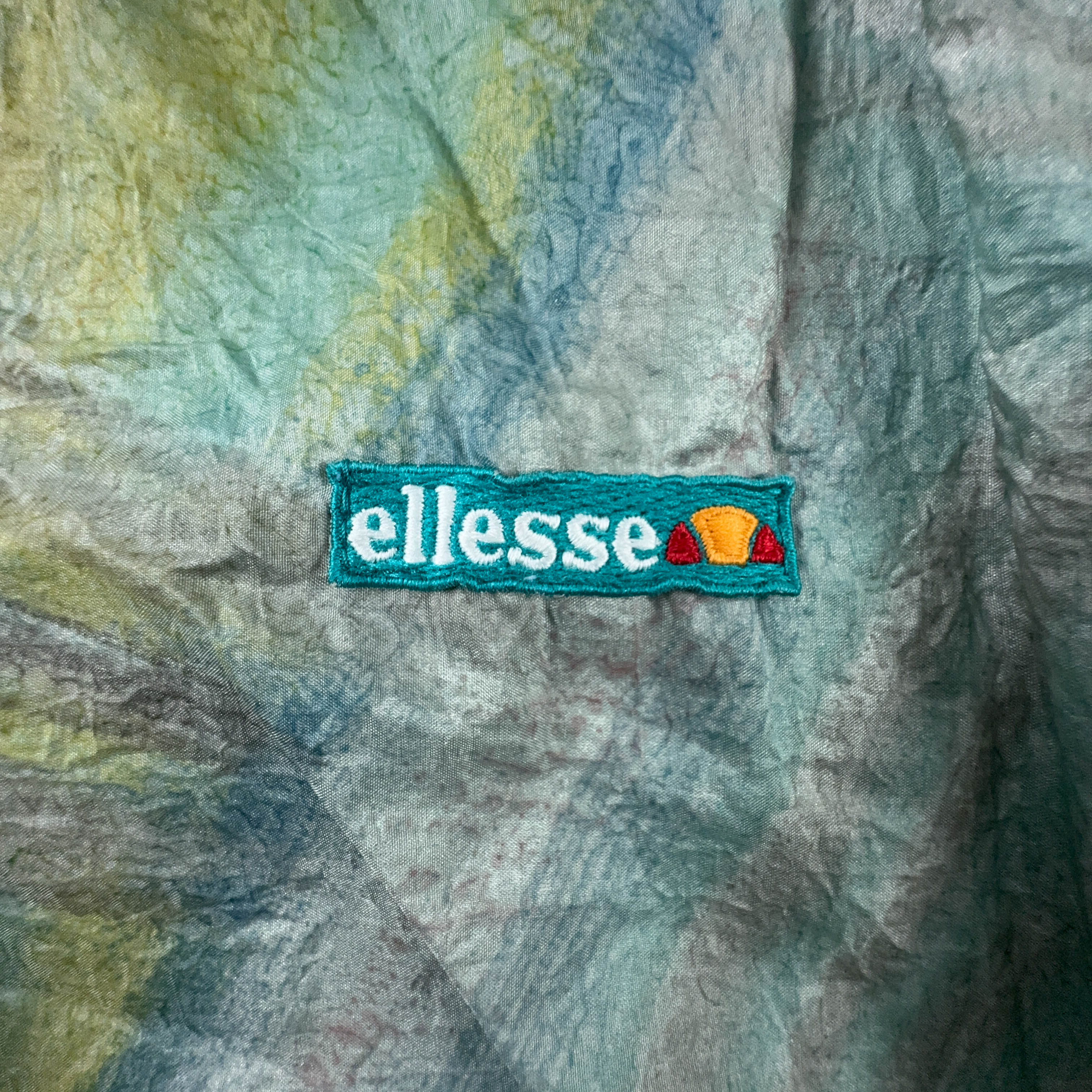 Giacca a vento Ellesse Vintage Double Face verde acqua con fantasia - Taglia M uomo