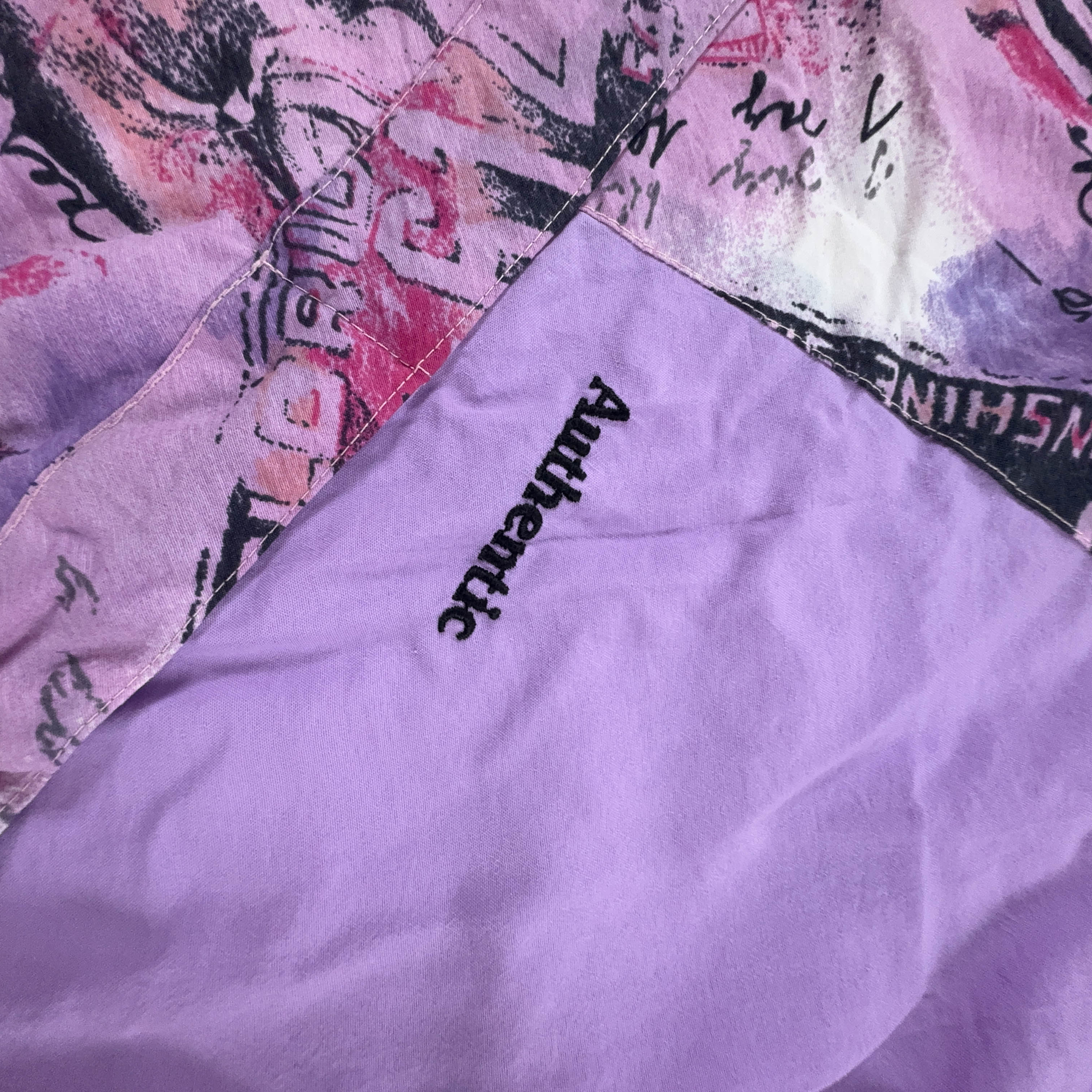Giacca a vento Vintage viola con fantasia all over e zip anni 90 - Taglia 44 uomo