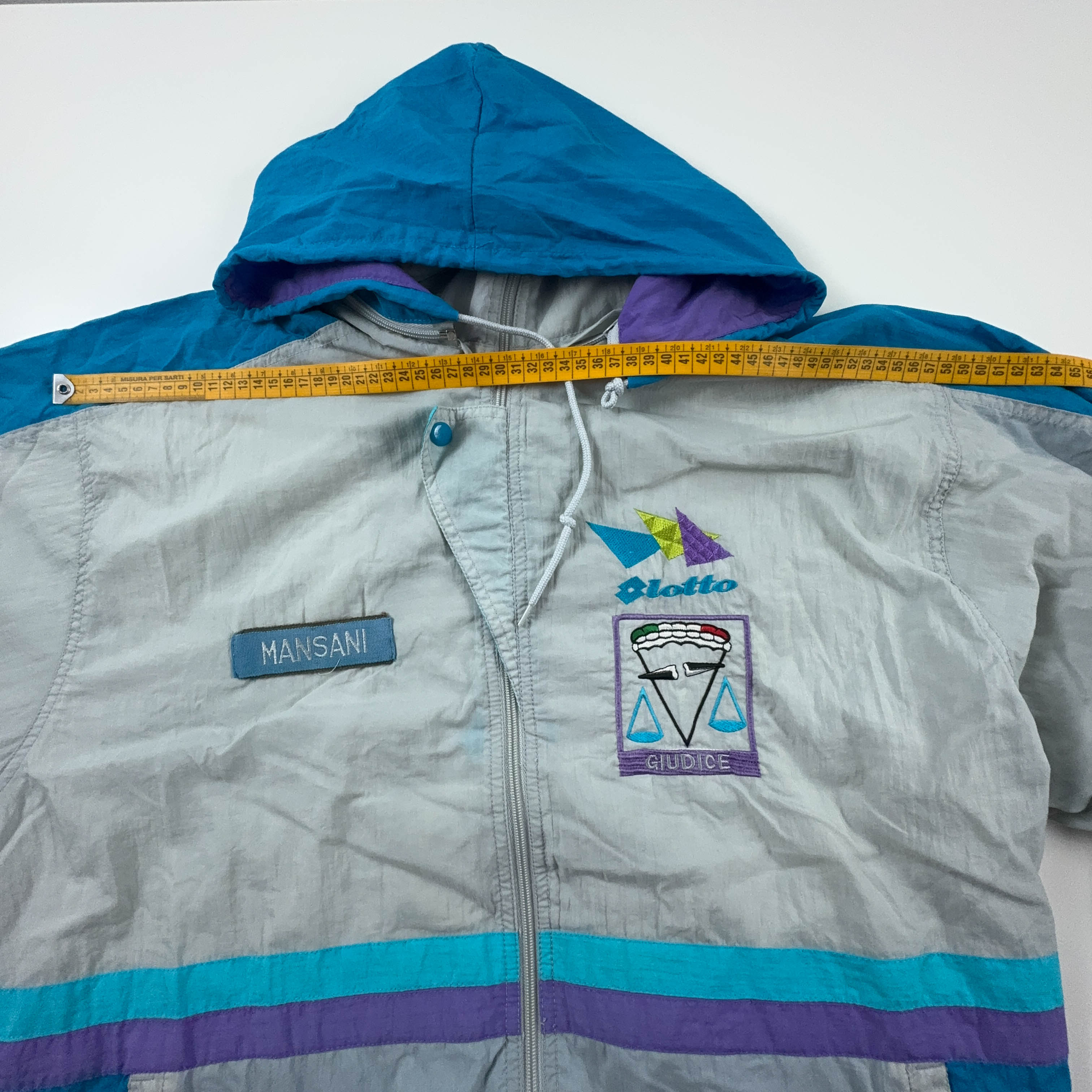 Giacca a vento Lotto Vintage bianca e azzurra con ricamo e zip anni 90 - Taglia XL uomo