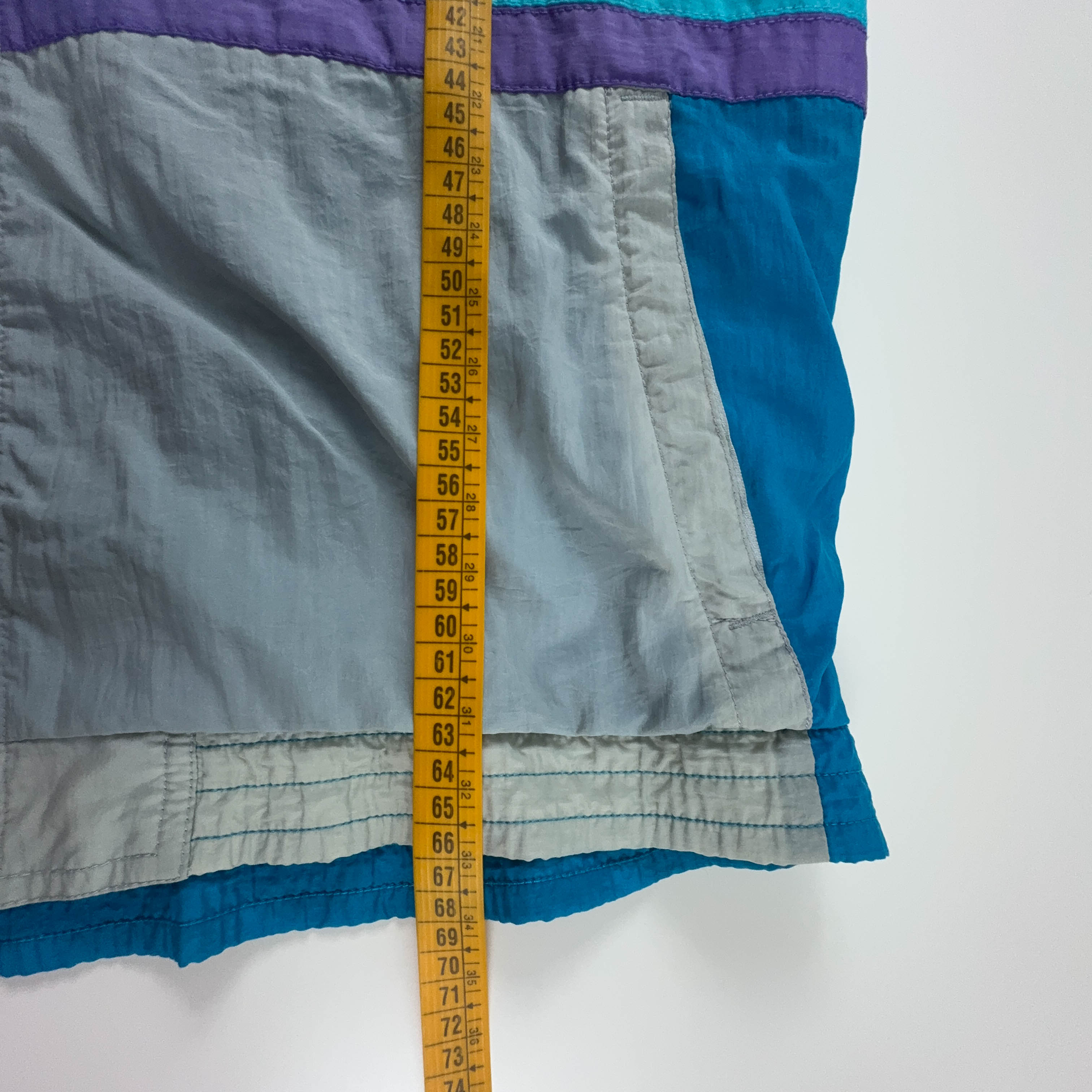 Giacca a vento Lotto Vintage bianca e azzurra con ricamo e zip anni 90 - Taglia XL uomo
