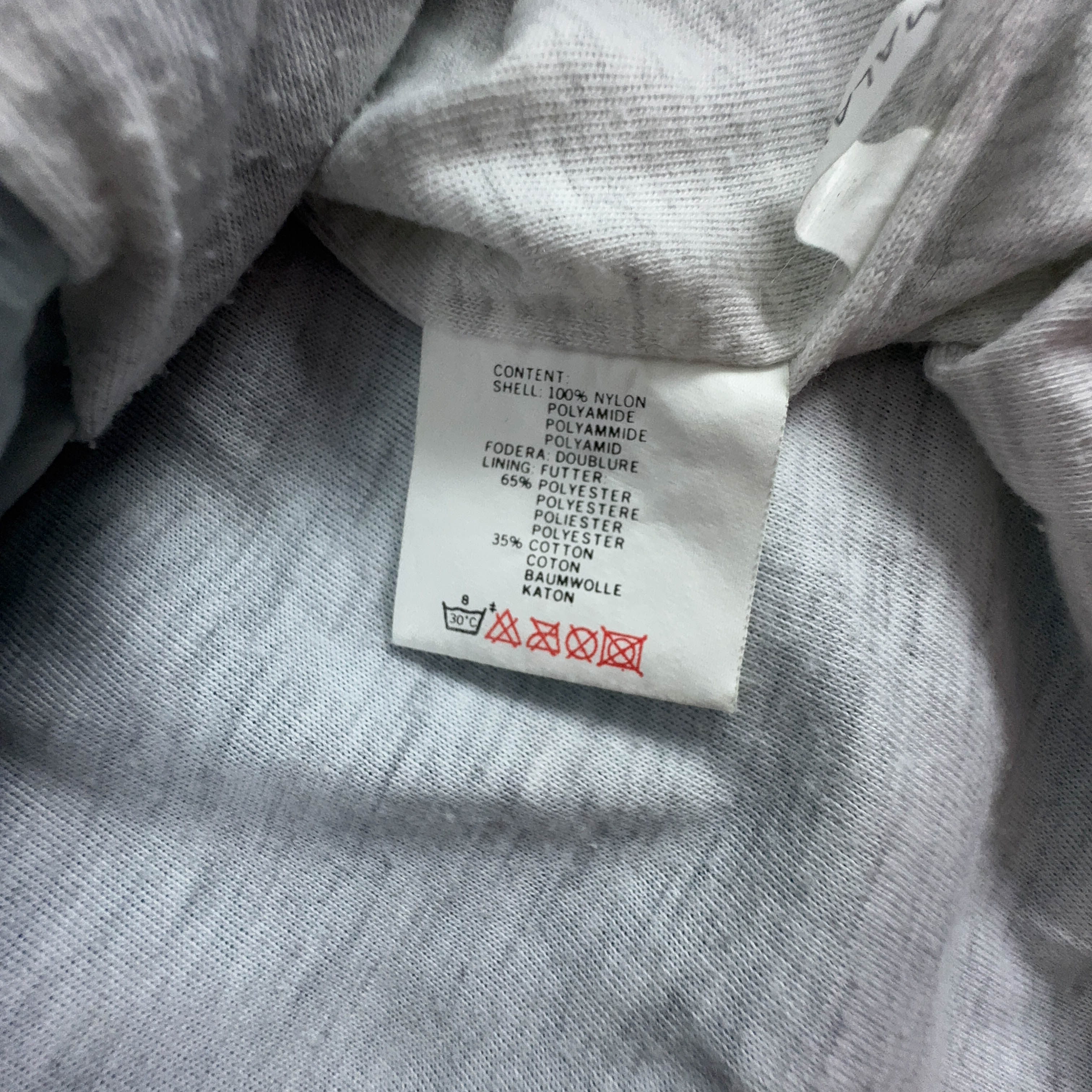Giacca a vento Lotto Vintage bianca e azzurra con ricamo e zip anni 90 - Taglia XL uomo