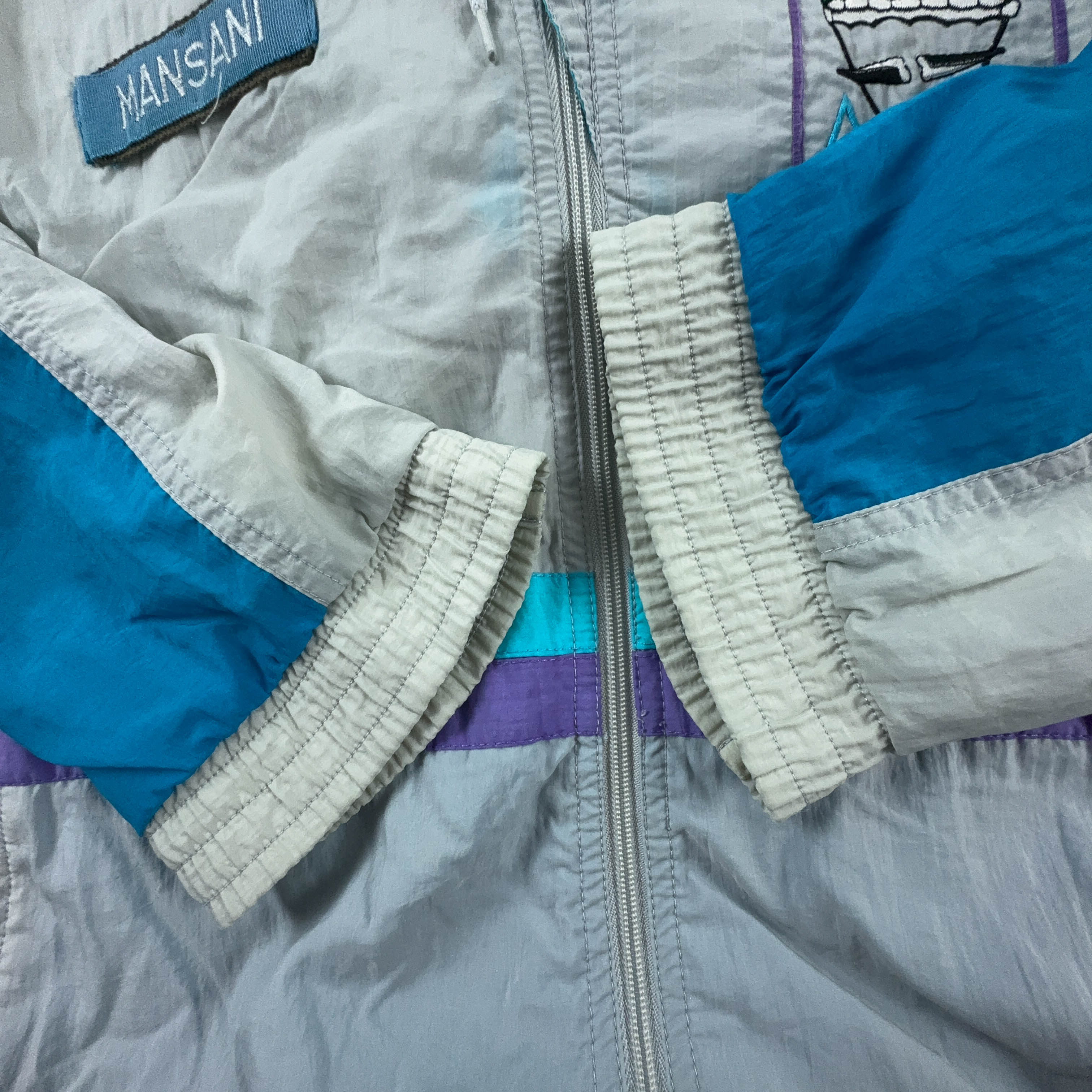 Giacca a vento Lotto Vintage bianca e azzurra con ricamo e zip anni 90 - Taglia XL uomo