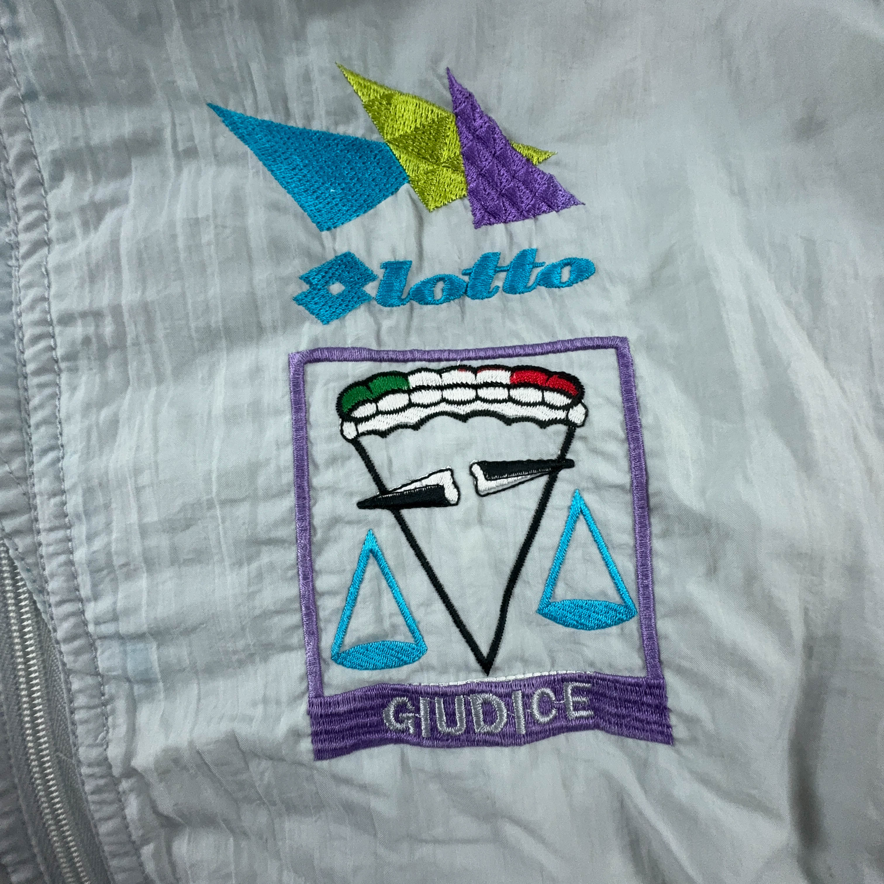 Giacca a vento Lotto Vintage bianca e azzurra con ricamo e zip anni 90 - Taglia XL uomo