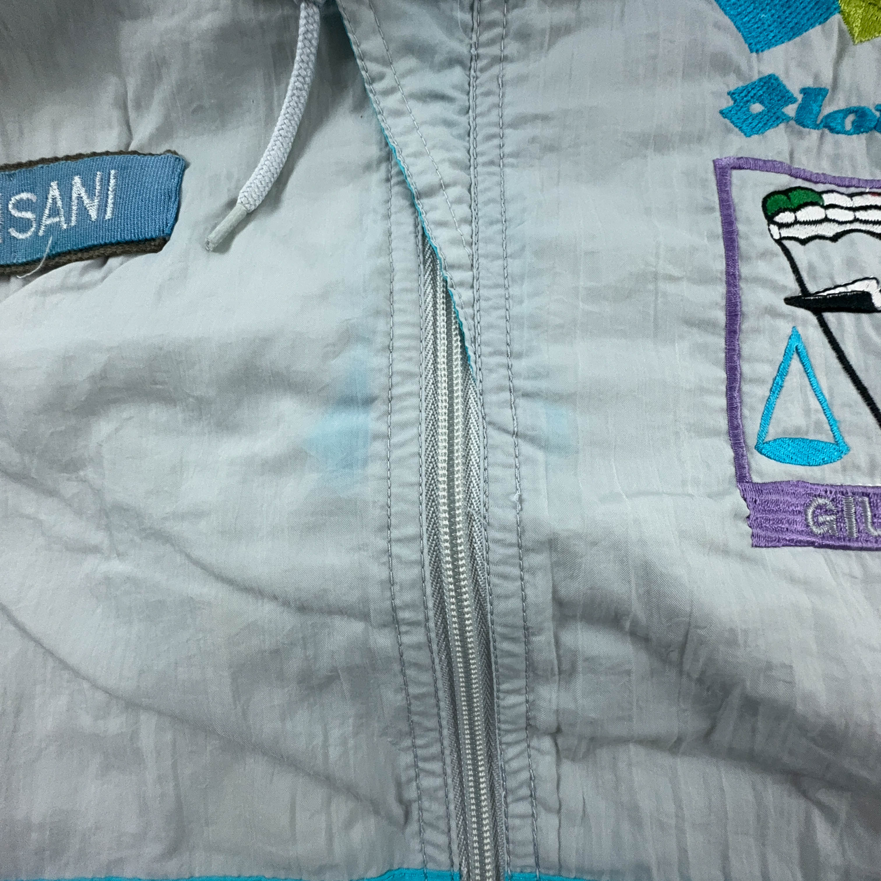 Giacca a vento Lotto Vintage bianca e azzurra con ricamo e zip anni 90 - Taglia XL uomo