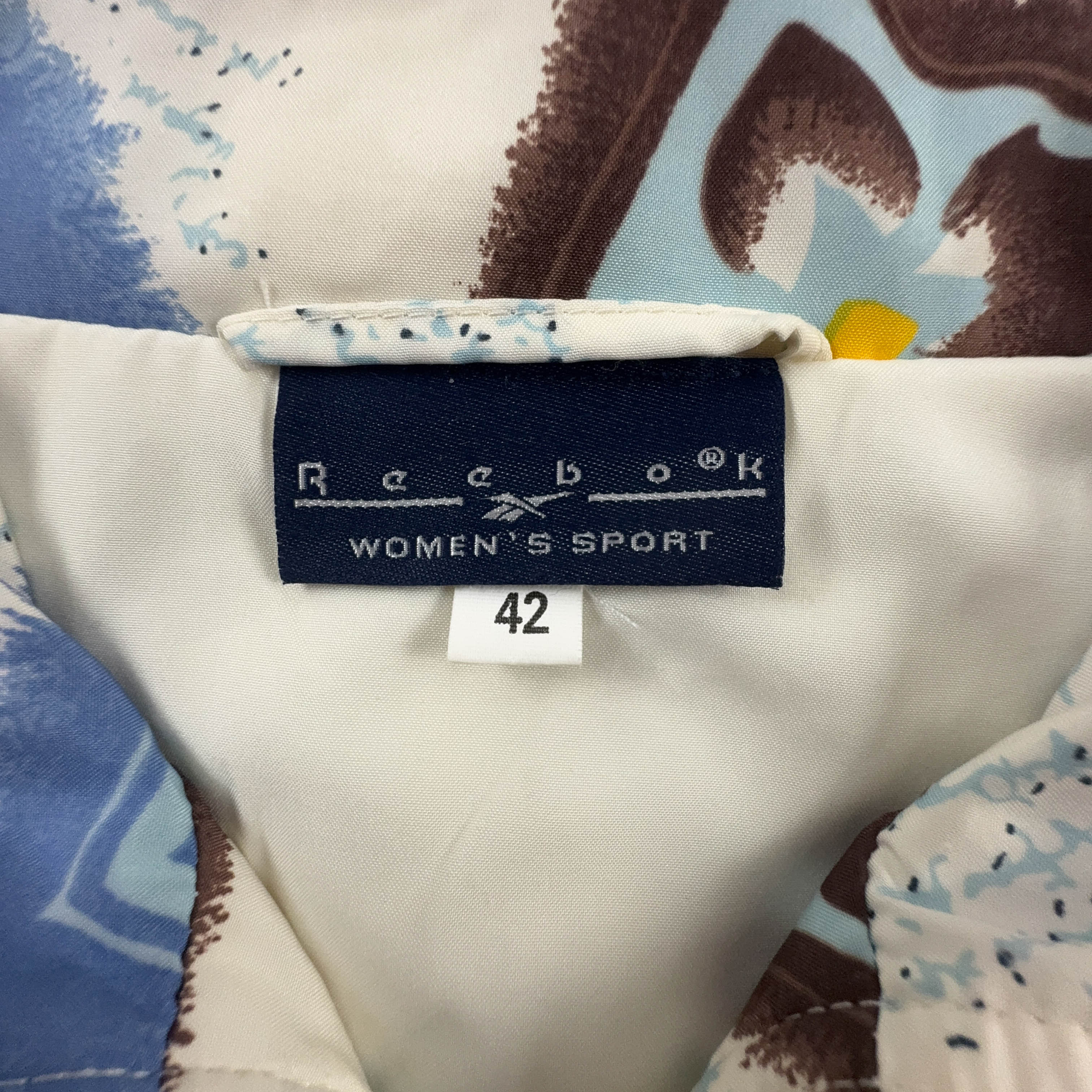 Giacca a vento Reebok Vintage crema con fantasia all over e zip anni 00 - Taglia 42 donna