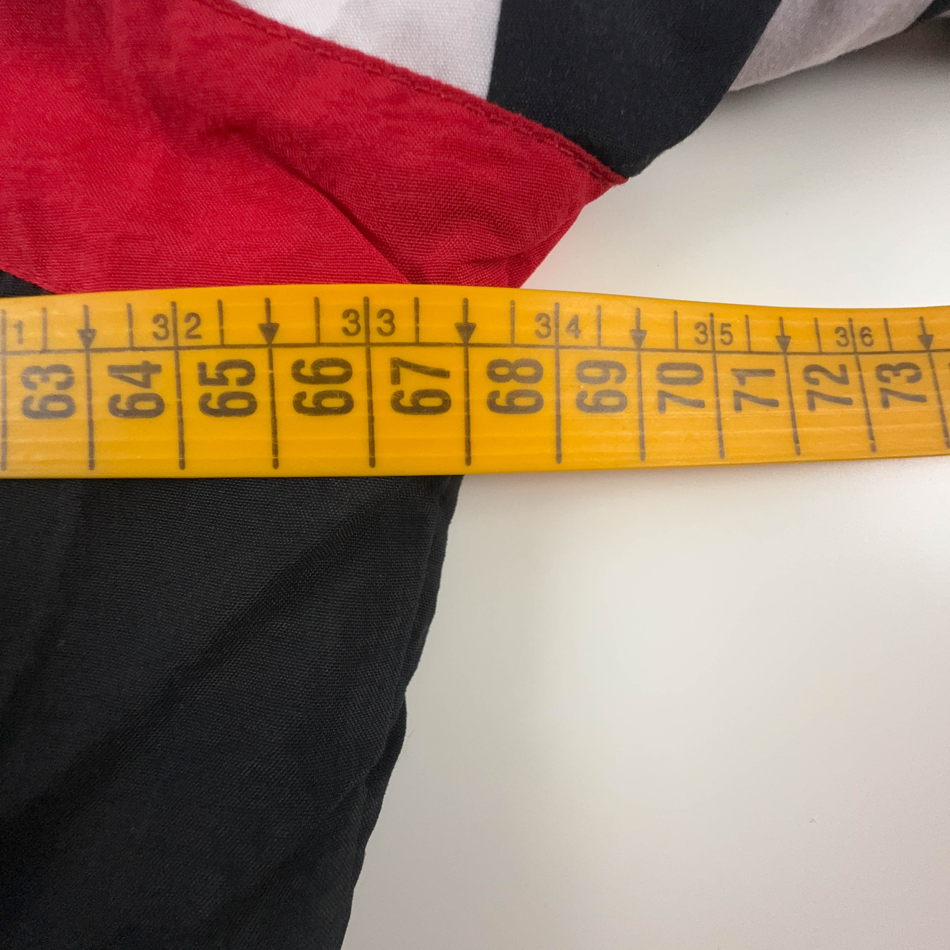 Giacca a vento Erima Vintage nera e bianca con fantasia a strisce e zip anni 90 - Taglia 7 uomo