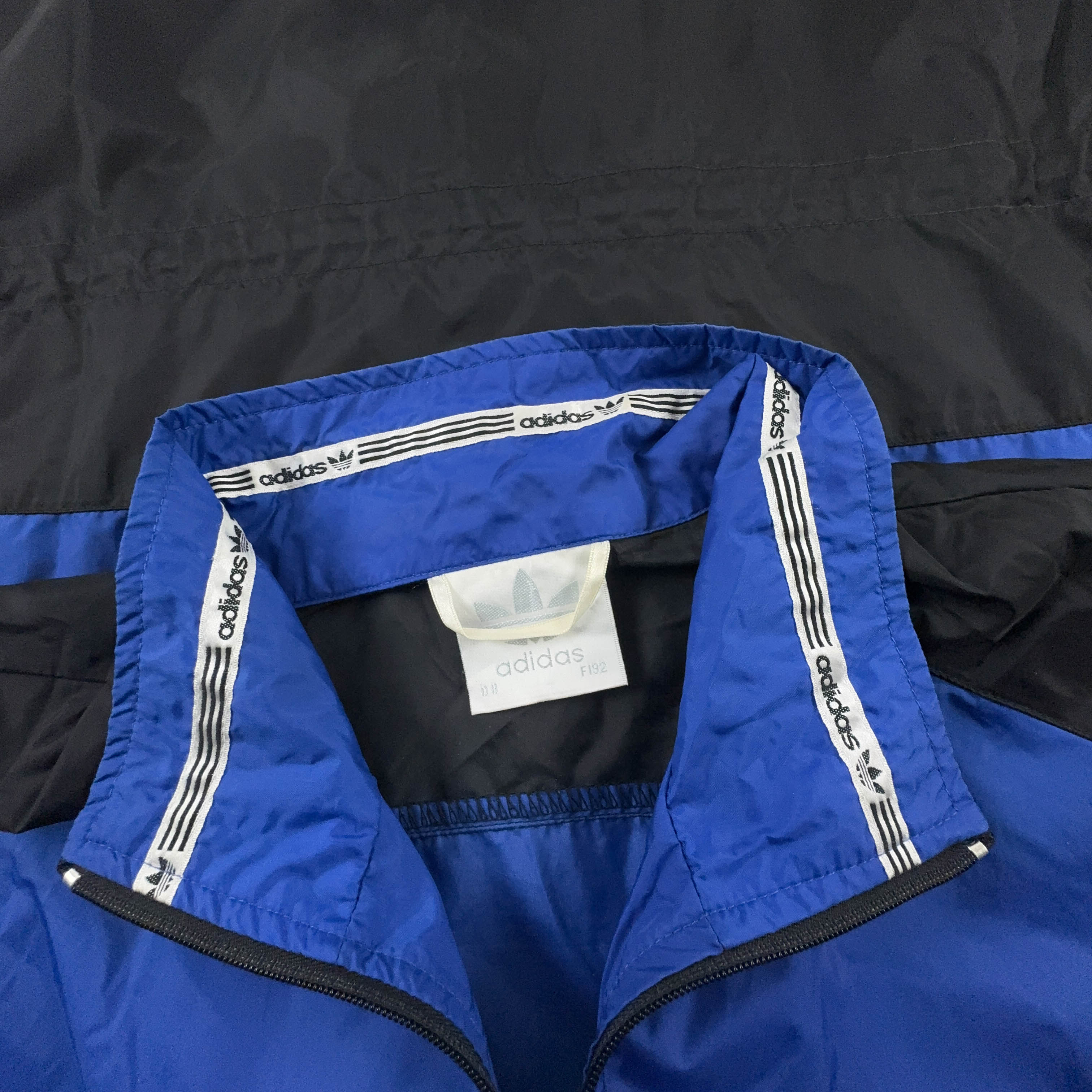 Giacca a vento Adidas Vintage nera e blu con zip anni 90 - Taglia 8 192 uomo