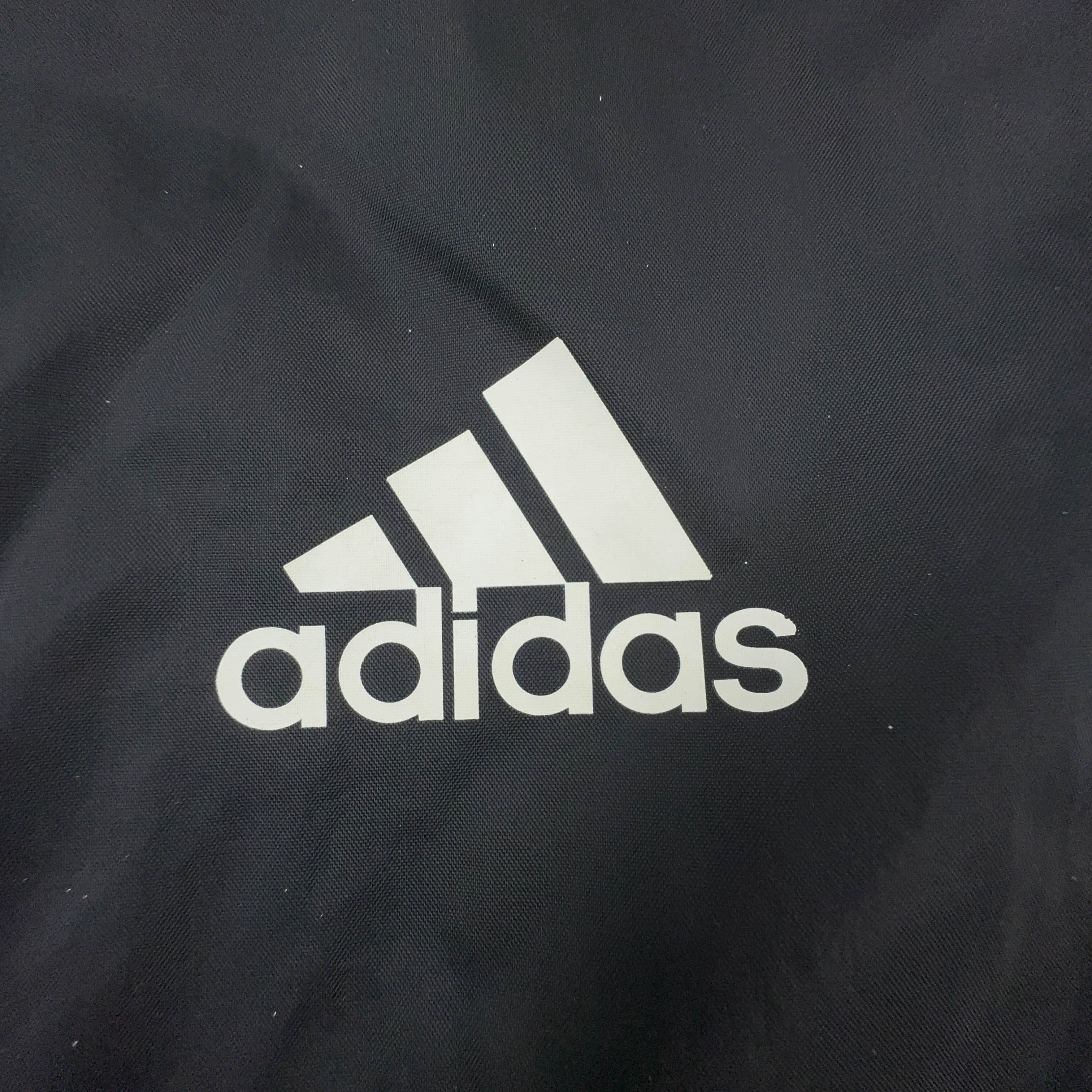 Giacca a vento Adidas Vintage nera e verde con zip anni 00 - Taglia 7 uomo