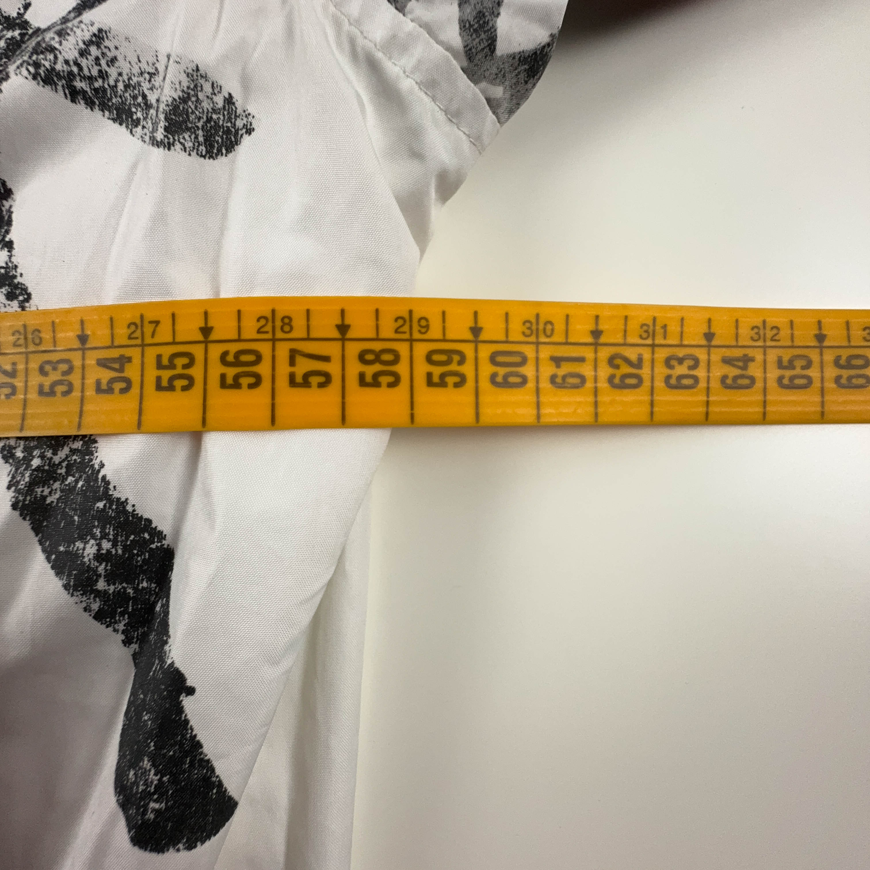 Giacca a vento Adidas Vintage bianca con stampa all over e zip anni 00 - Taglia L uomo