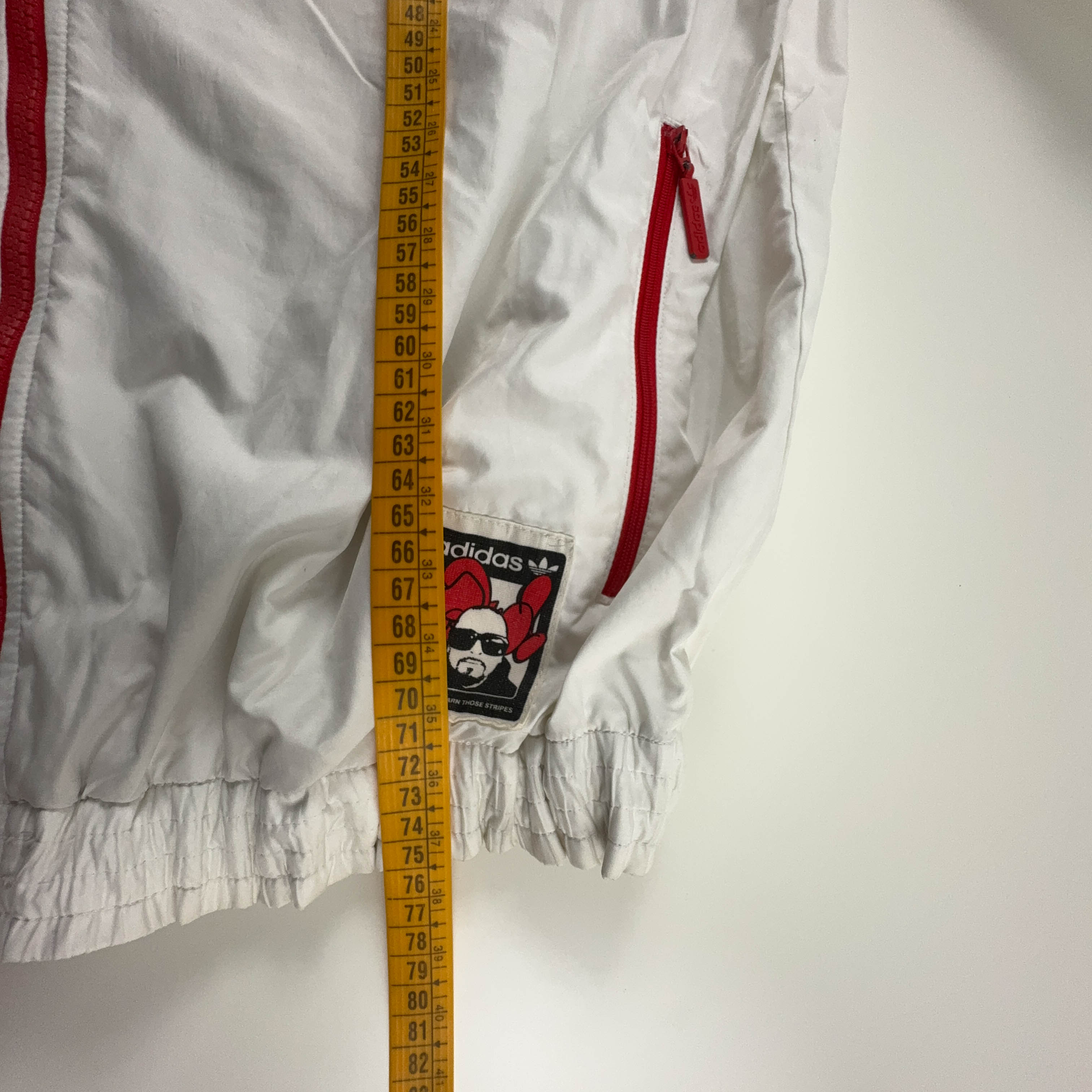 Giacca a vento Adidas Vintage bianca con stampa all over e zip anni 00 - Taglia L uomo
