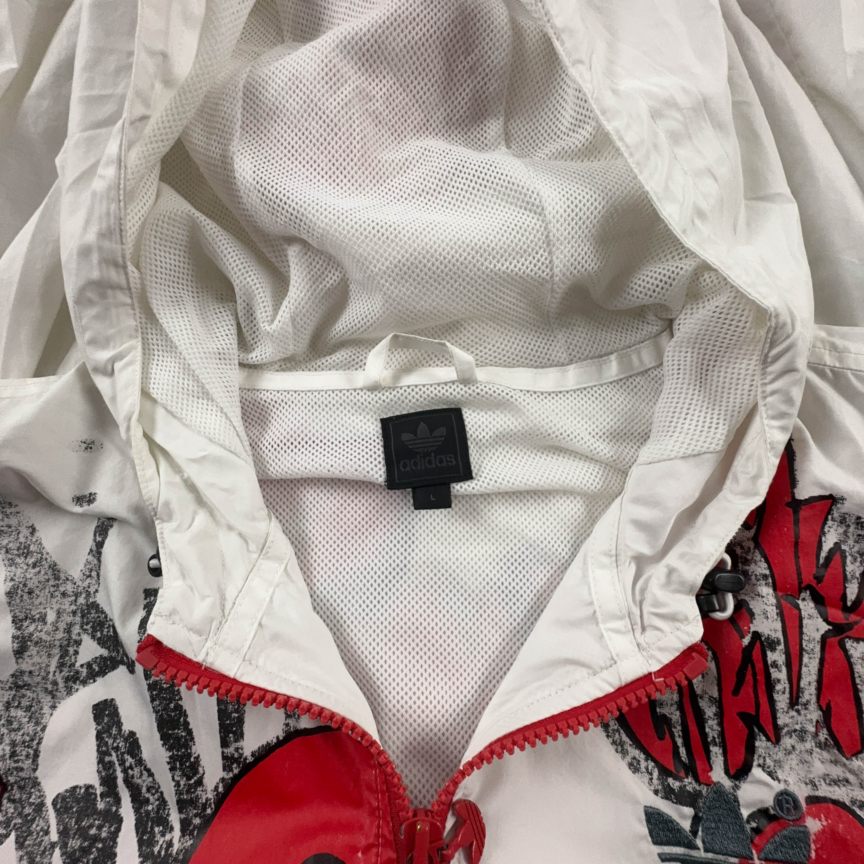 Giacca a vento Adidas Vintage bianca con stampa all over e zip anni 00 - Taglia L uomo