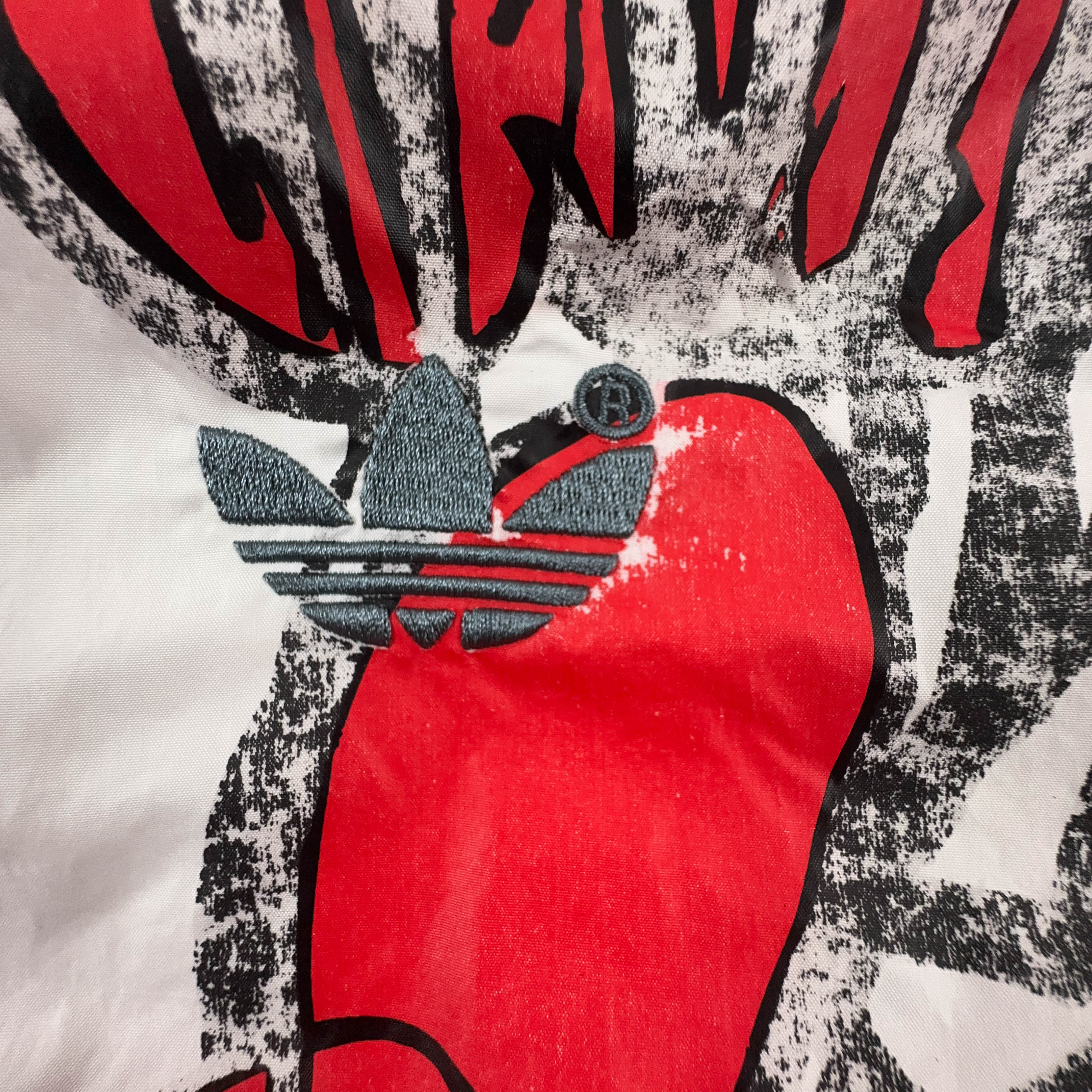 Giacca a vento Adidas Vintage bianca con stampa all over e zip anni 00 - Taglia L uomo