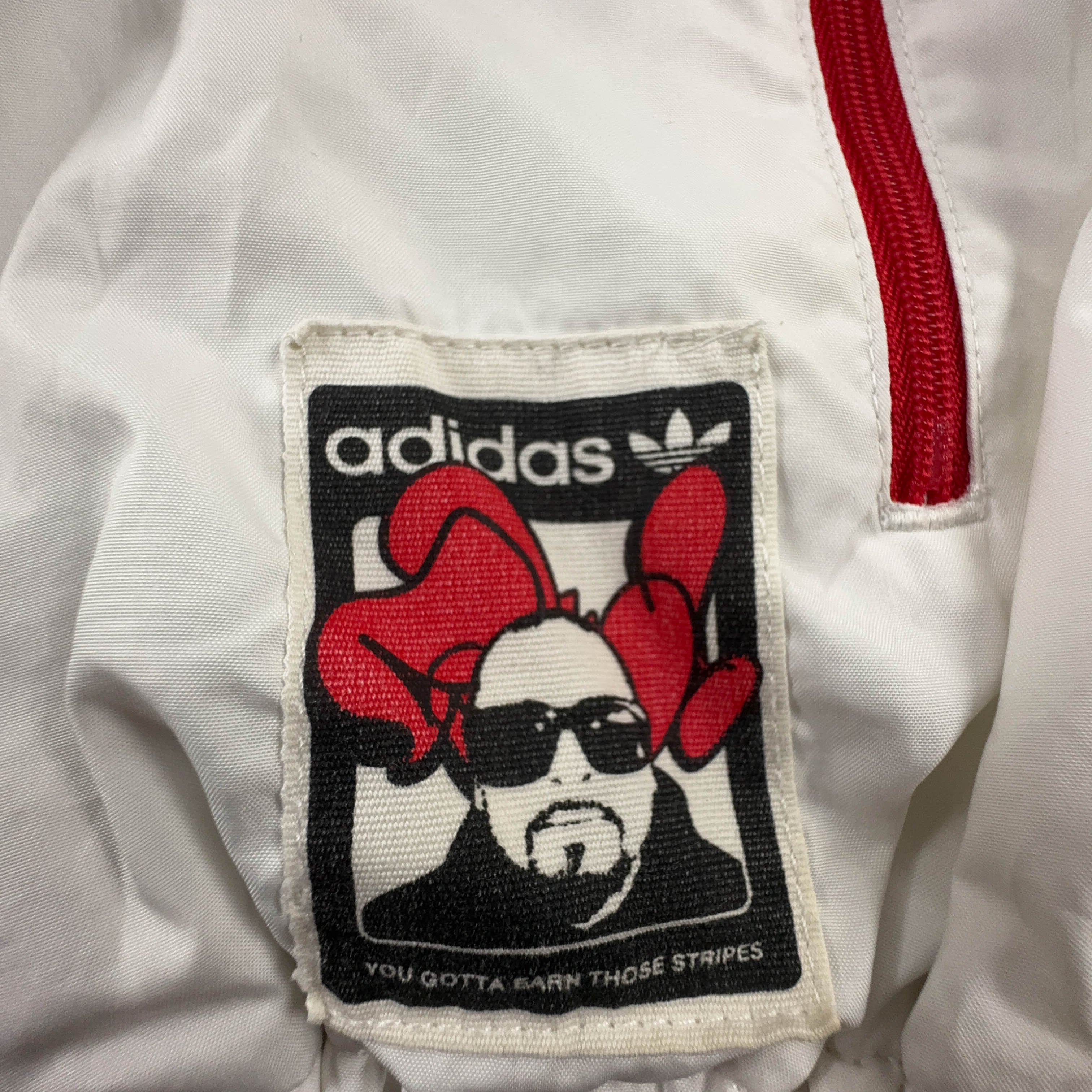 Giacca a vento Adidas Vintage bianca con stampa all over e zip anni 00 - Taglia L uomo