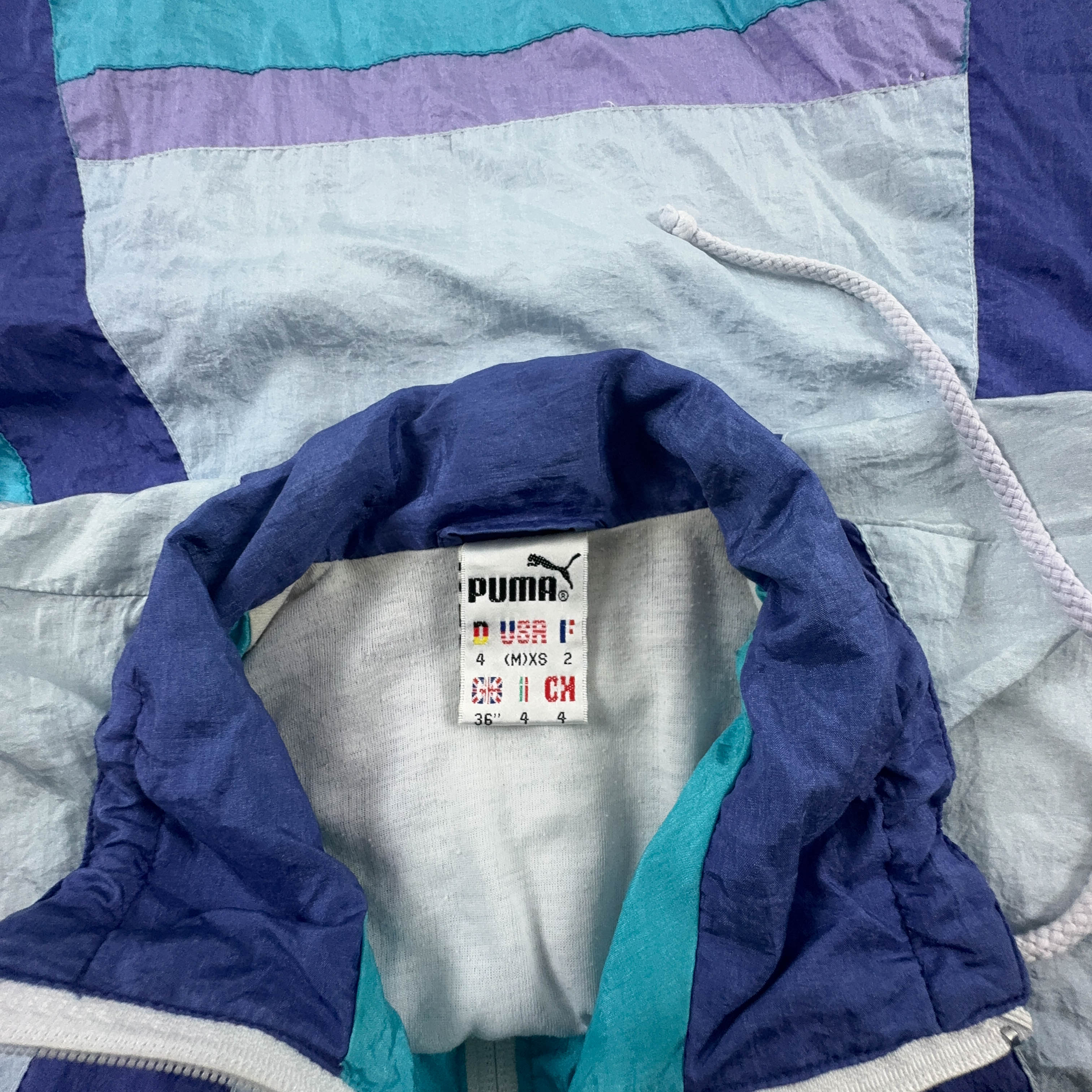 Giacca a vento Puma Vintage azzurra e viola con zip anni 80 - Taglia M uomo