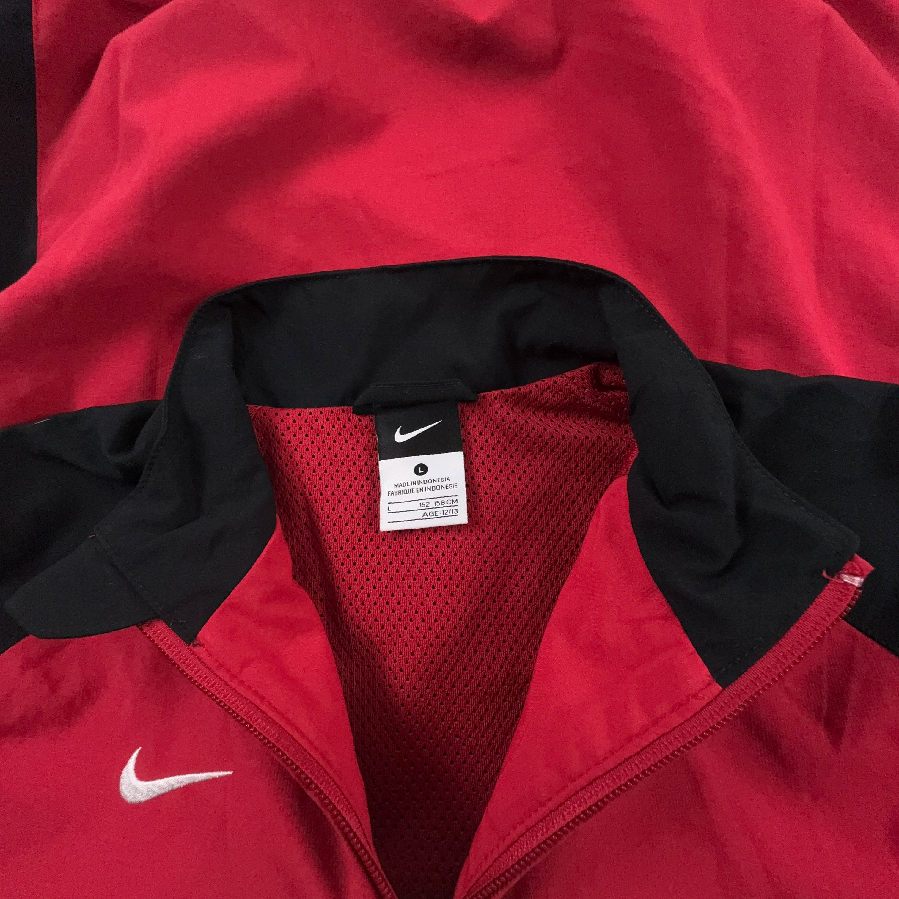 Giacca a vento Nike Vintage rossa e nera con zip anni 00 - Taglia XS uomo