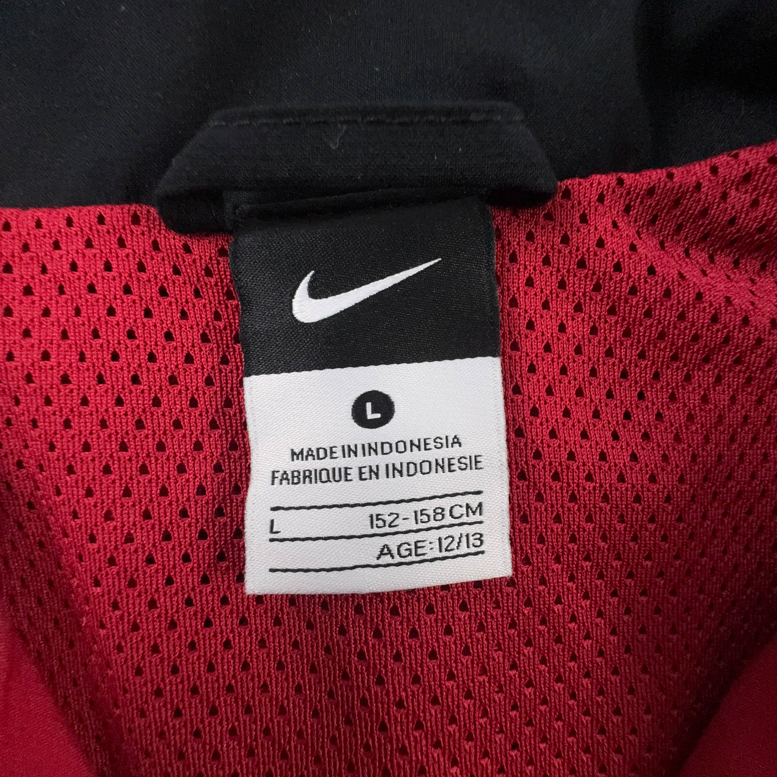 Giacca a vento Nike Vintage rossa e nera con zip anni 00 - Taglia XS uomo