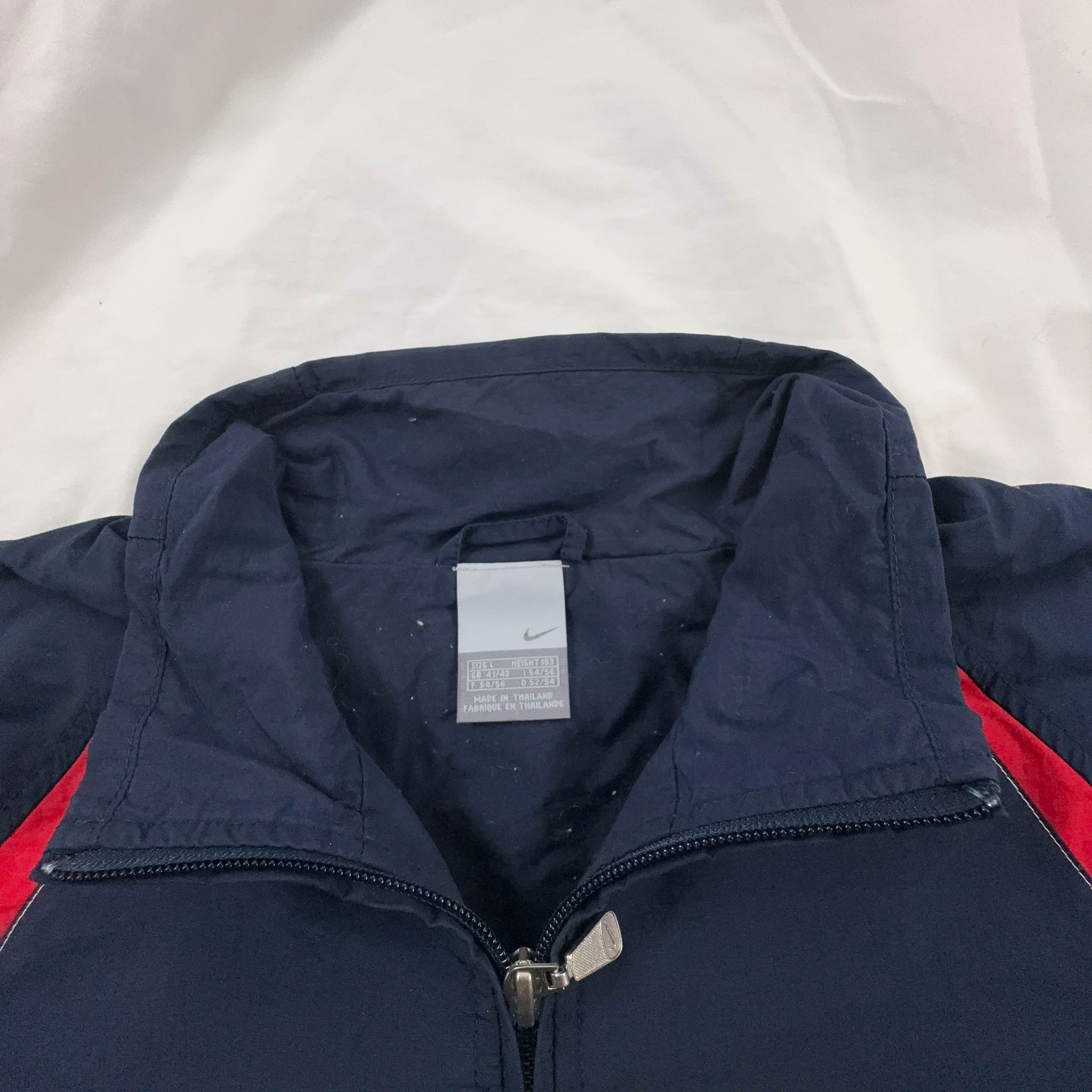 Giacca a vento Nike Vintage blu e bianca con zip anni 00 - Taglia L 183 uomo