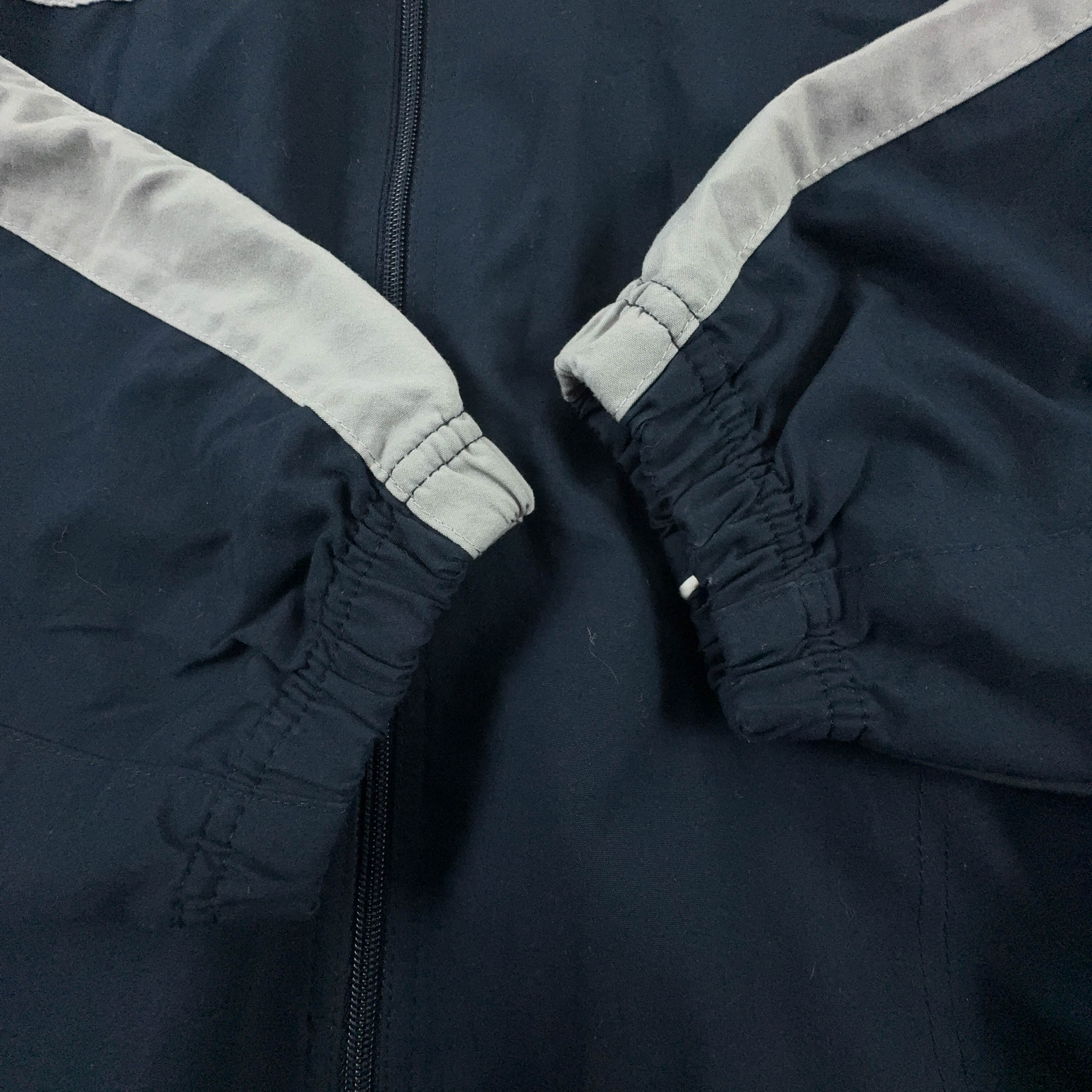 Giacca a vento Reebok Vintage blu scura con zip anni 90 - Taglia M uomo