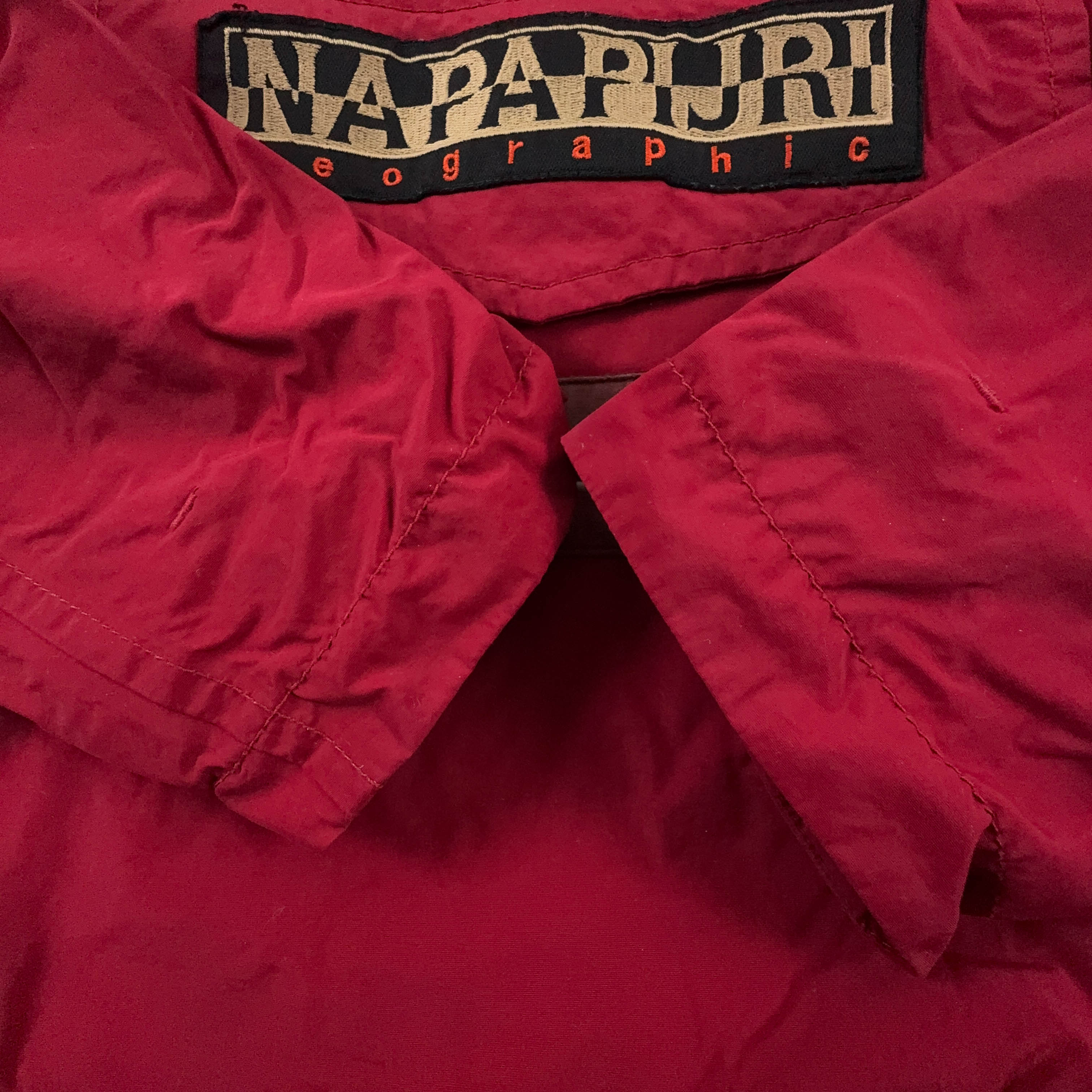 Giubbotto invernale Napapijri rosso con cappuccio e tasca frontale - Taglia XS uomo