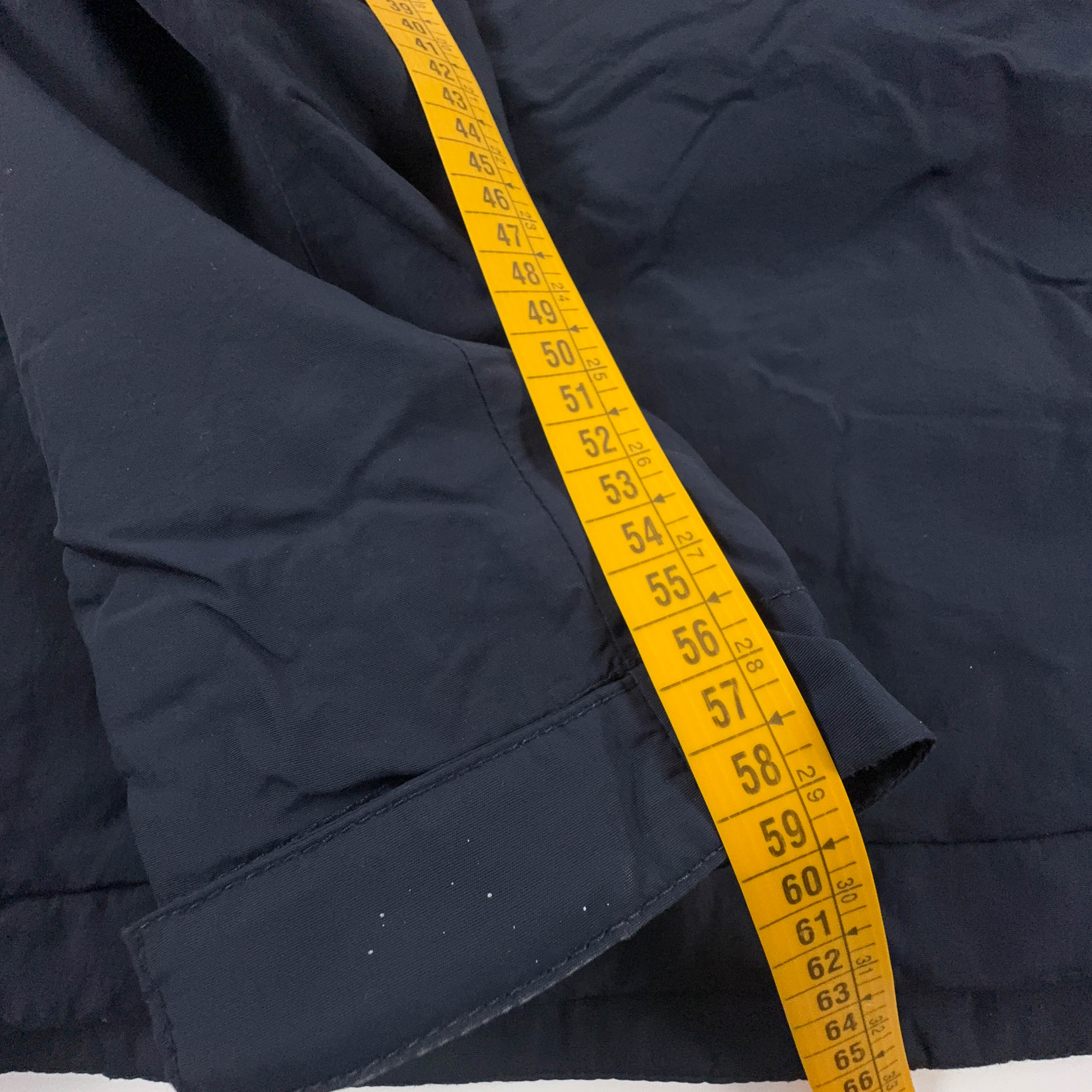 Giubbotto invernale Napapijri blu scura con tasca frontale e cappuccio - Taglia S uomo