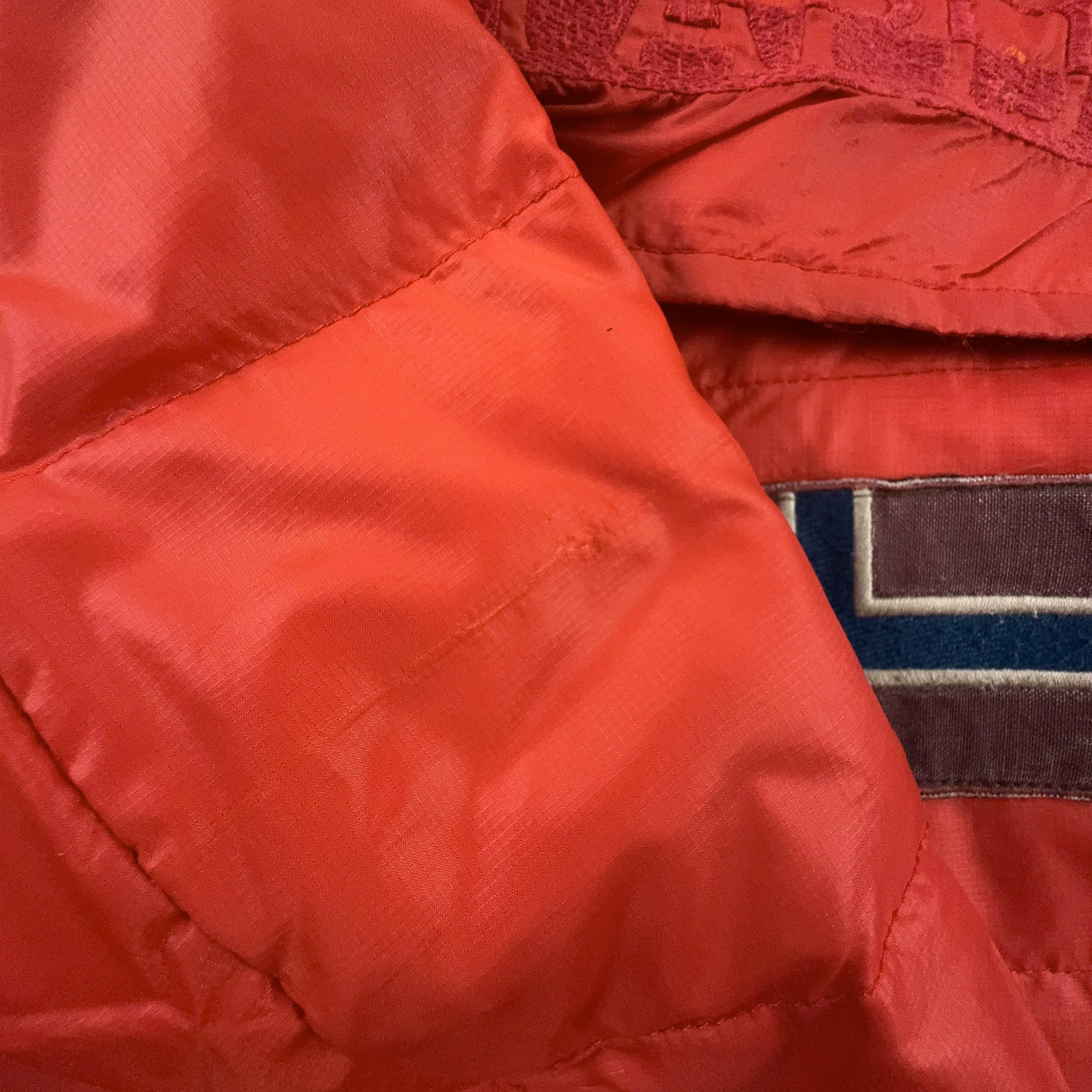 Giubbotto Napapijri arancione con tasca frontale e cappuccio - Taglia L uomo