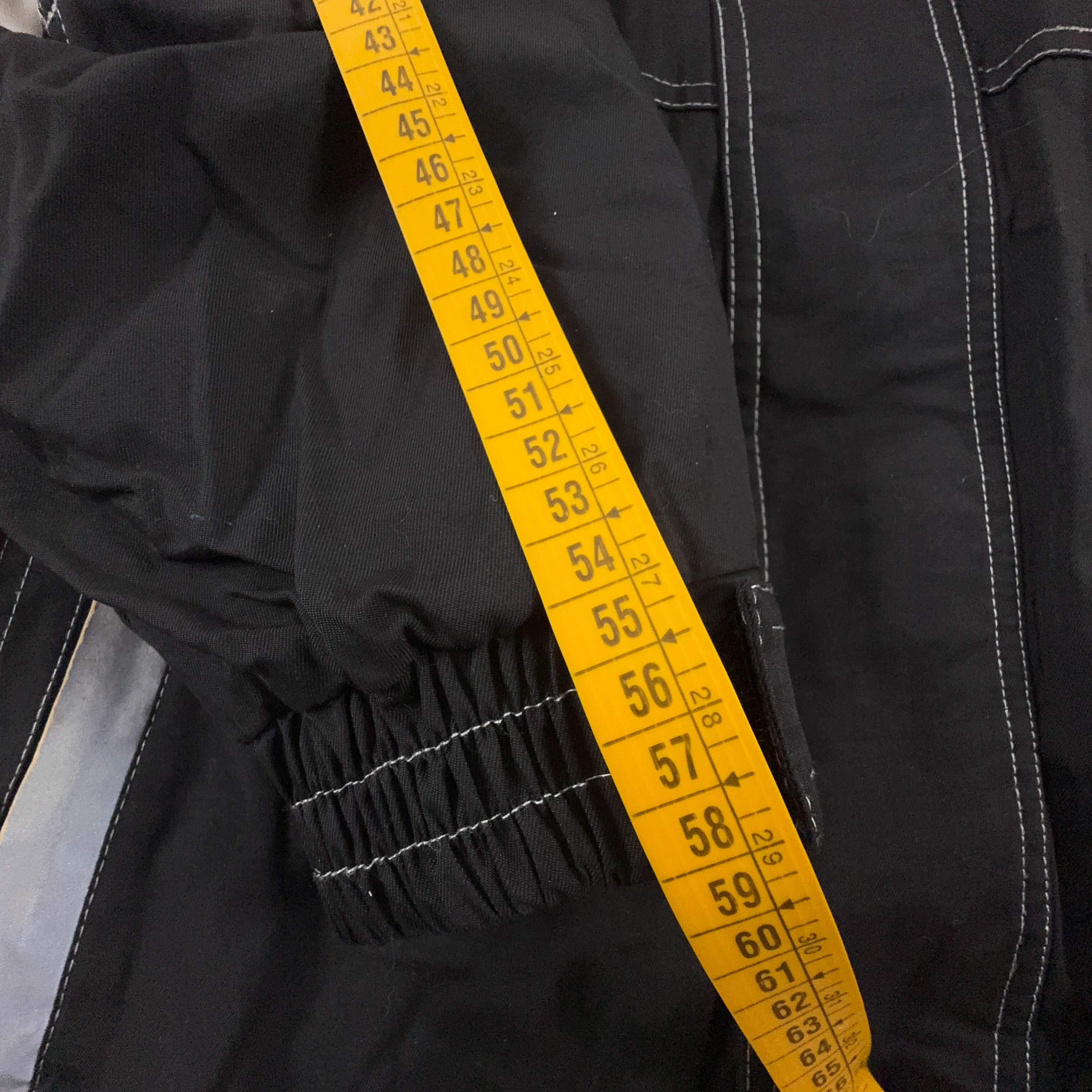 Giacca invernale Sergio Tacchini Vintage nera e bianca con tasche e zip anni 00 - Taglia L uomo