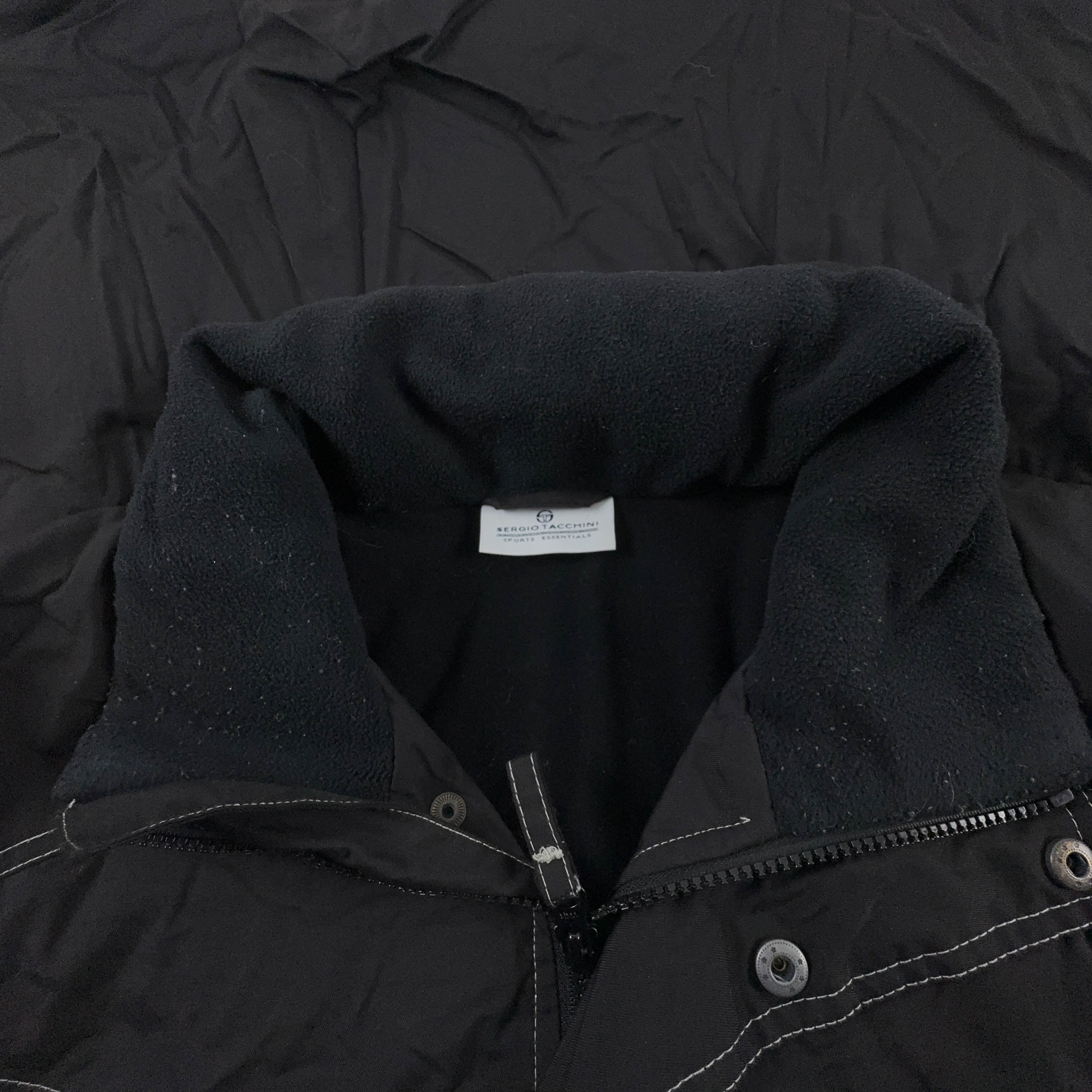 Giacca invernale Sergio Tacchini Vintage nera e bianca con tasche e zip anni 00 - Taglia L uomo