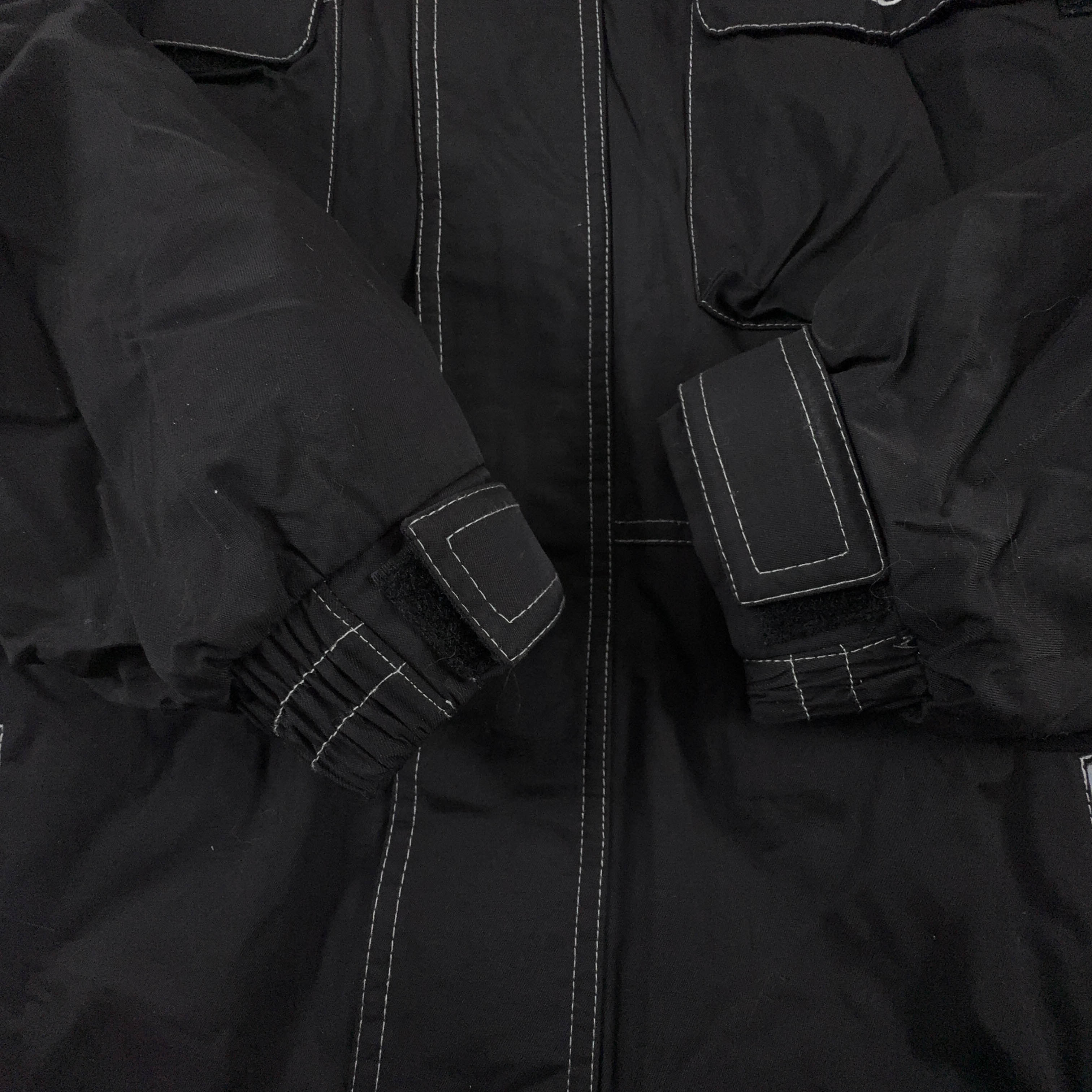 Giacca invernale Sergio Tacchini Vintage nera e bianca con tasche e zip anni 00 - Taglia L uomo