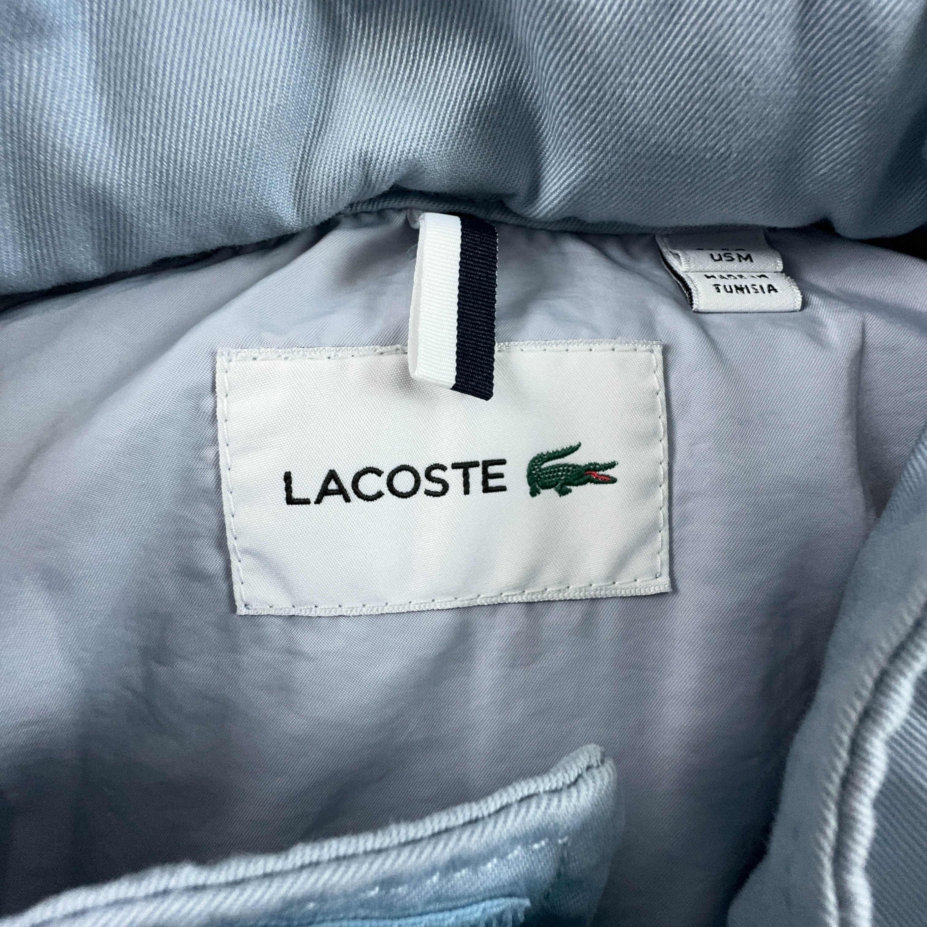 Giacca Lacoste azzurra in cotone con tasche e cappuccio - Taglia M uomo