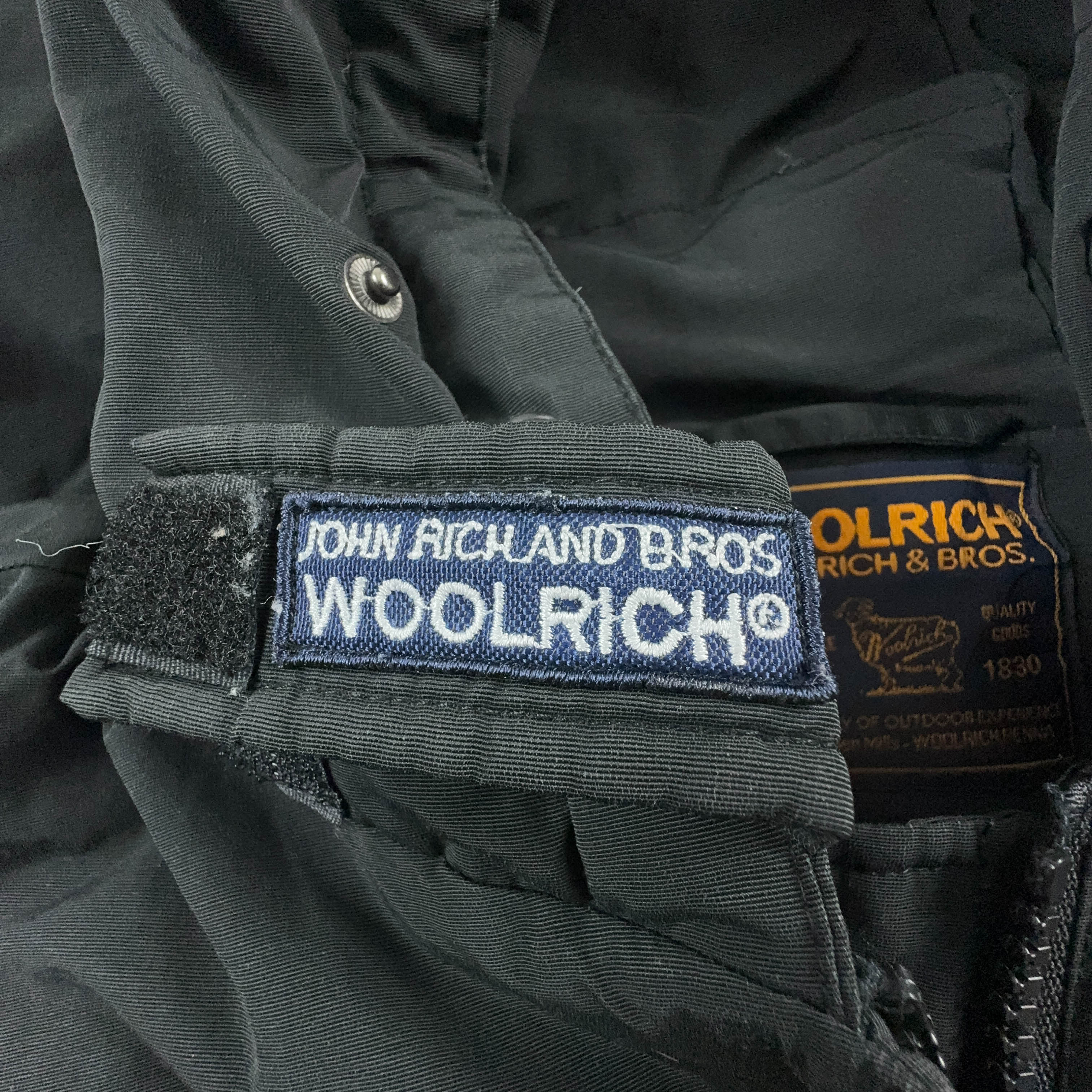 Giubbotto Woolrich nero con cappuccio 50% piuma - Taglia S uomo