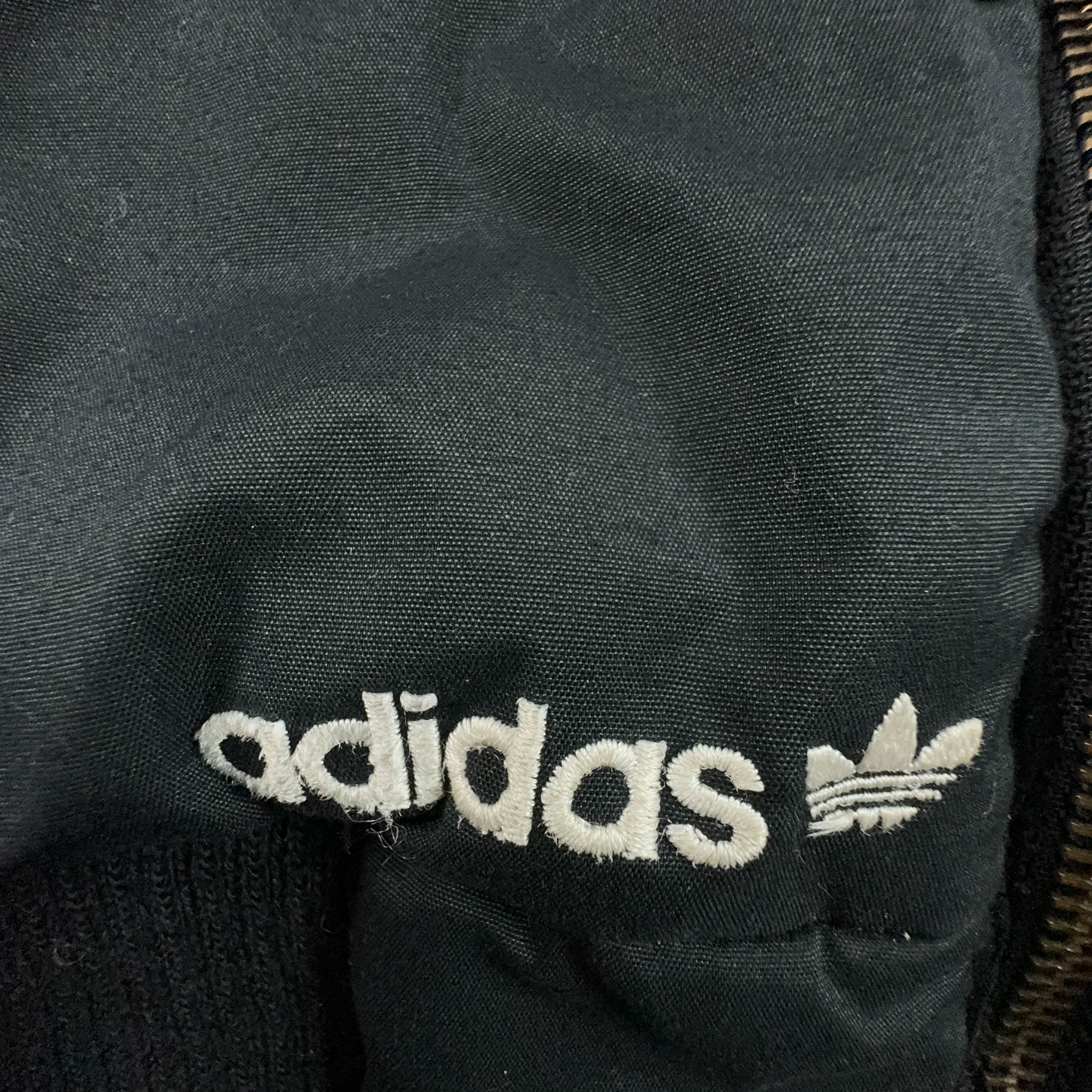 Giubbotto Adidas Vintage nero anni 2000 lungo con zip e cappuccio - Taglia M/L uomo