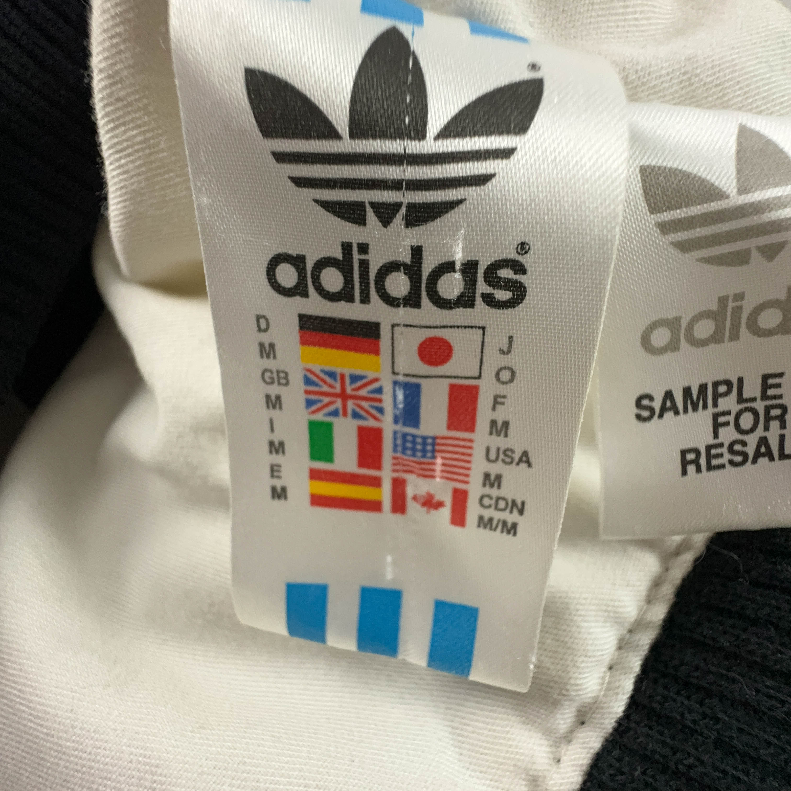 Giubbotto Adidas Vintage nero anni 2000 lungo con zip e cappuccio - Taglia M/L uomo