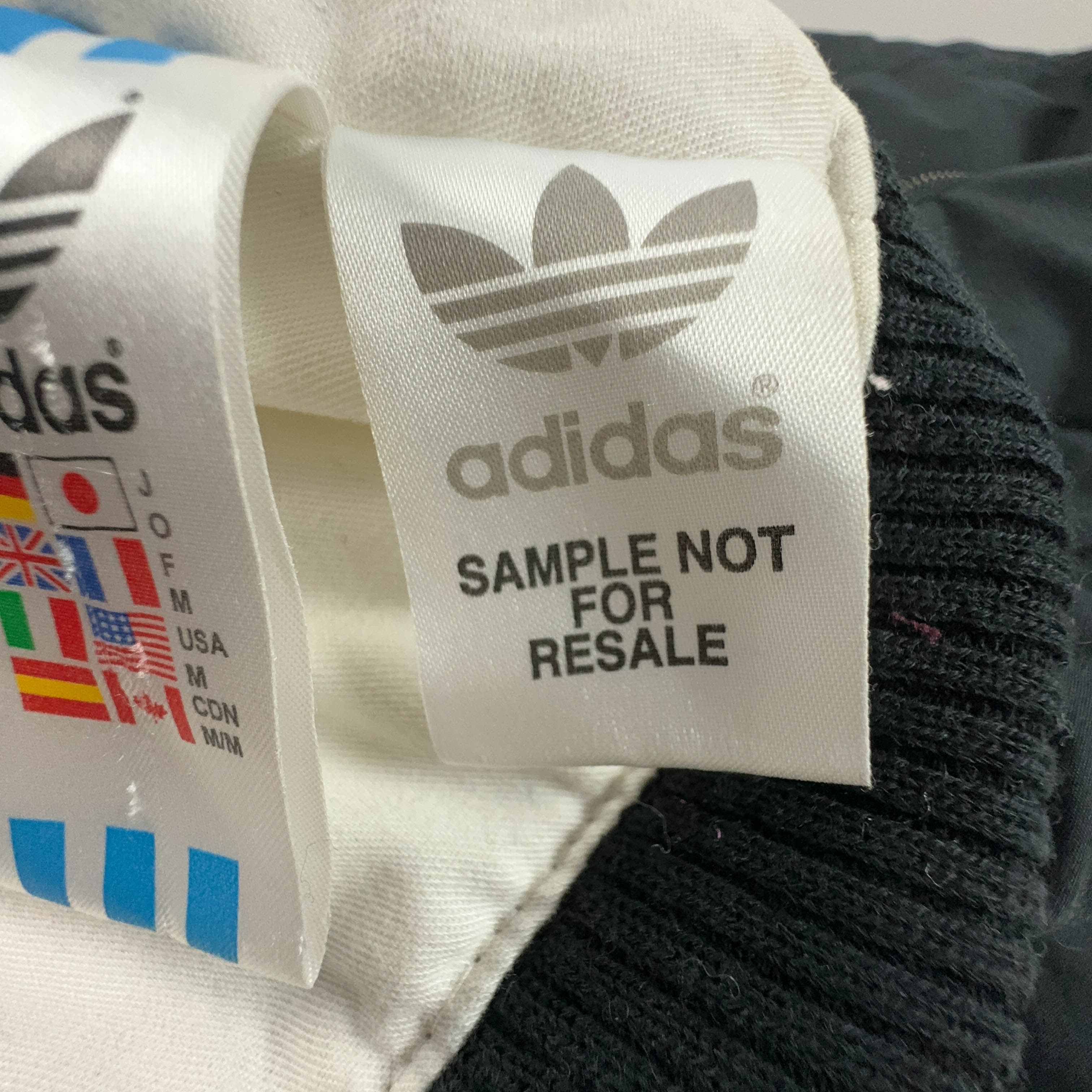 Giubbotto Adidas Vintage nero anni 2000 lungo con zip e cappuccio - Taglia M/L uomo